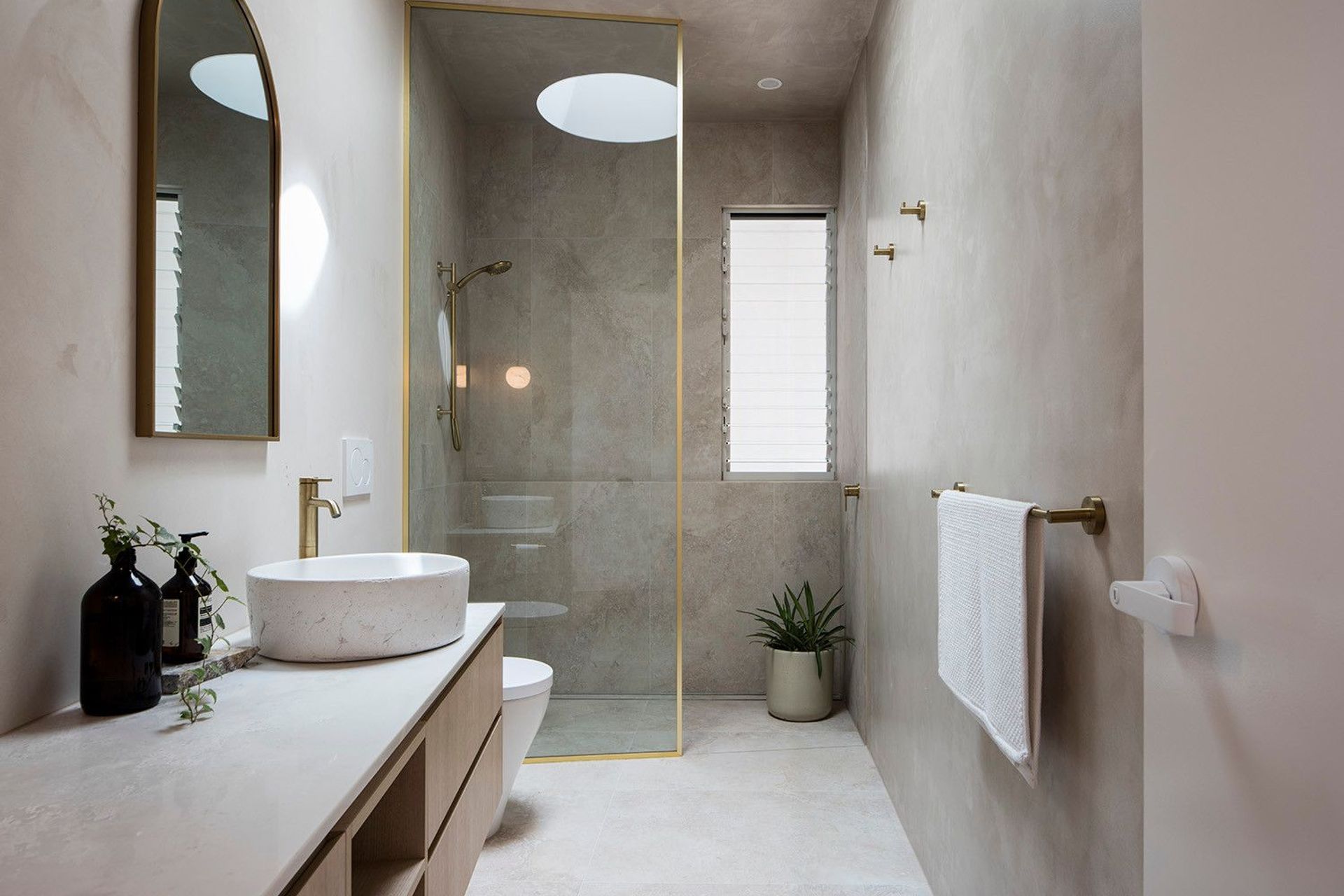 Viner Residence - Bathroom. Vanity and walk in shower in soft grey tones.