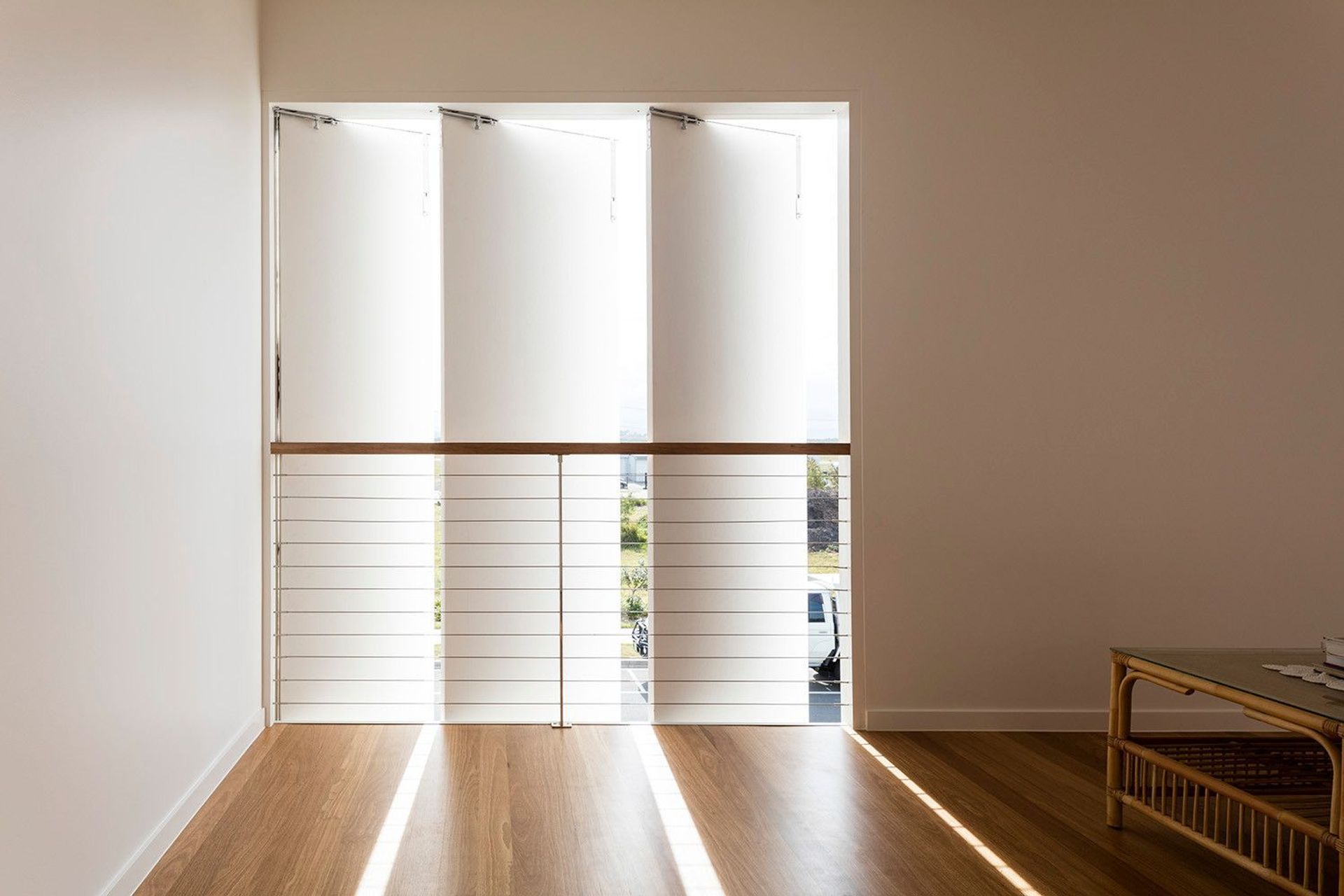 Viner Residence - Bedroom. Bedroom with louvred windows and sheer curtains.