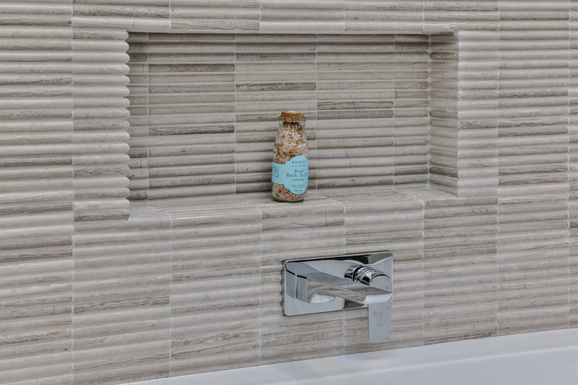 TILE DEPOT / Tiles: Colosseum Travertine 305x305mm.  Fantastic mitring detail. Tiling by ARC Tiling NZ. / Tap : Olympia Wall Mounted basin Mixer Chrome