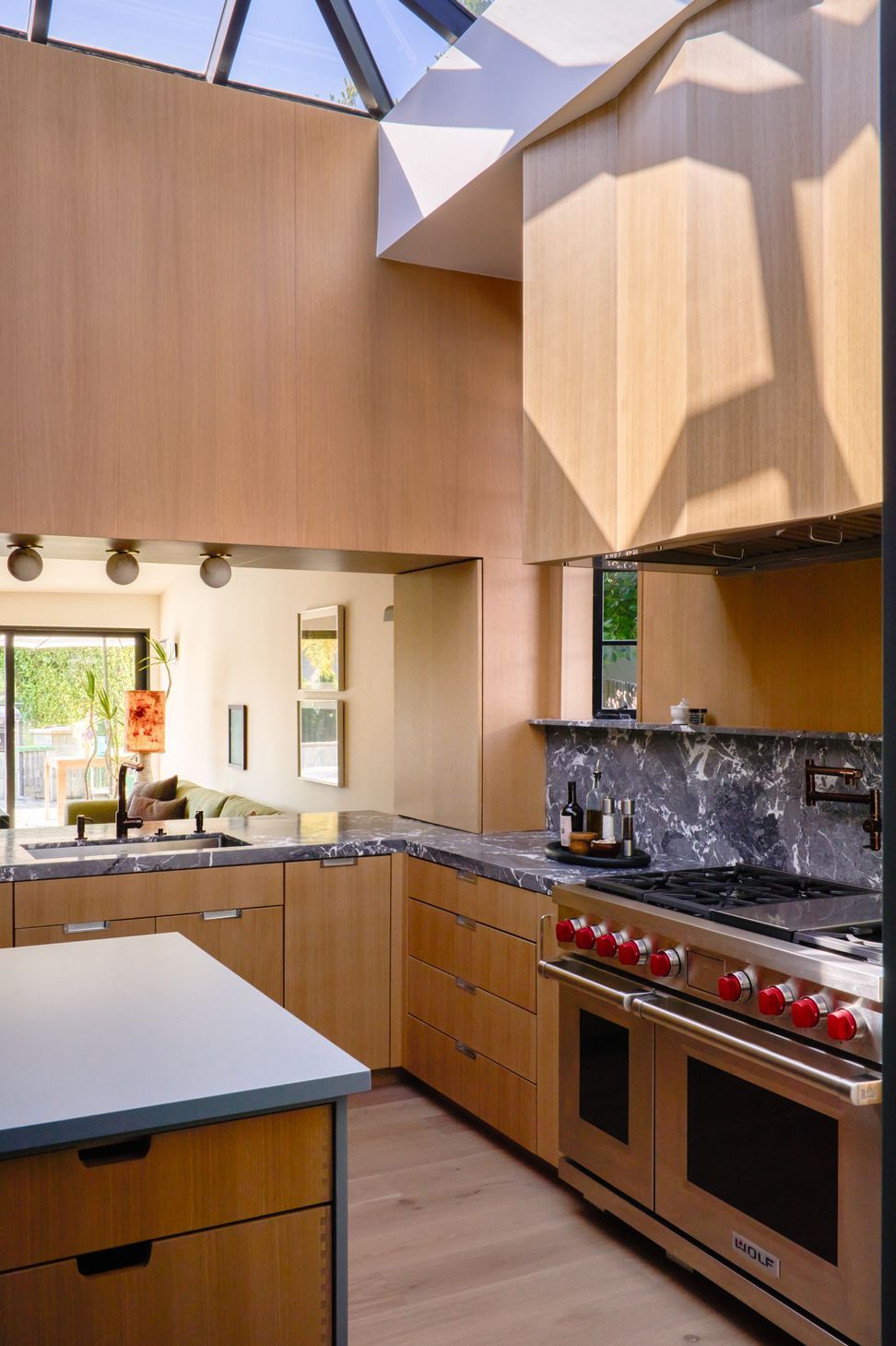 dona-marta-the-warren-interior-design-mid-century-modern-kitchen-skylight-faceted-hood-family-room-view-43-studio-city-ap-compressed.jpg