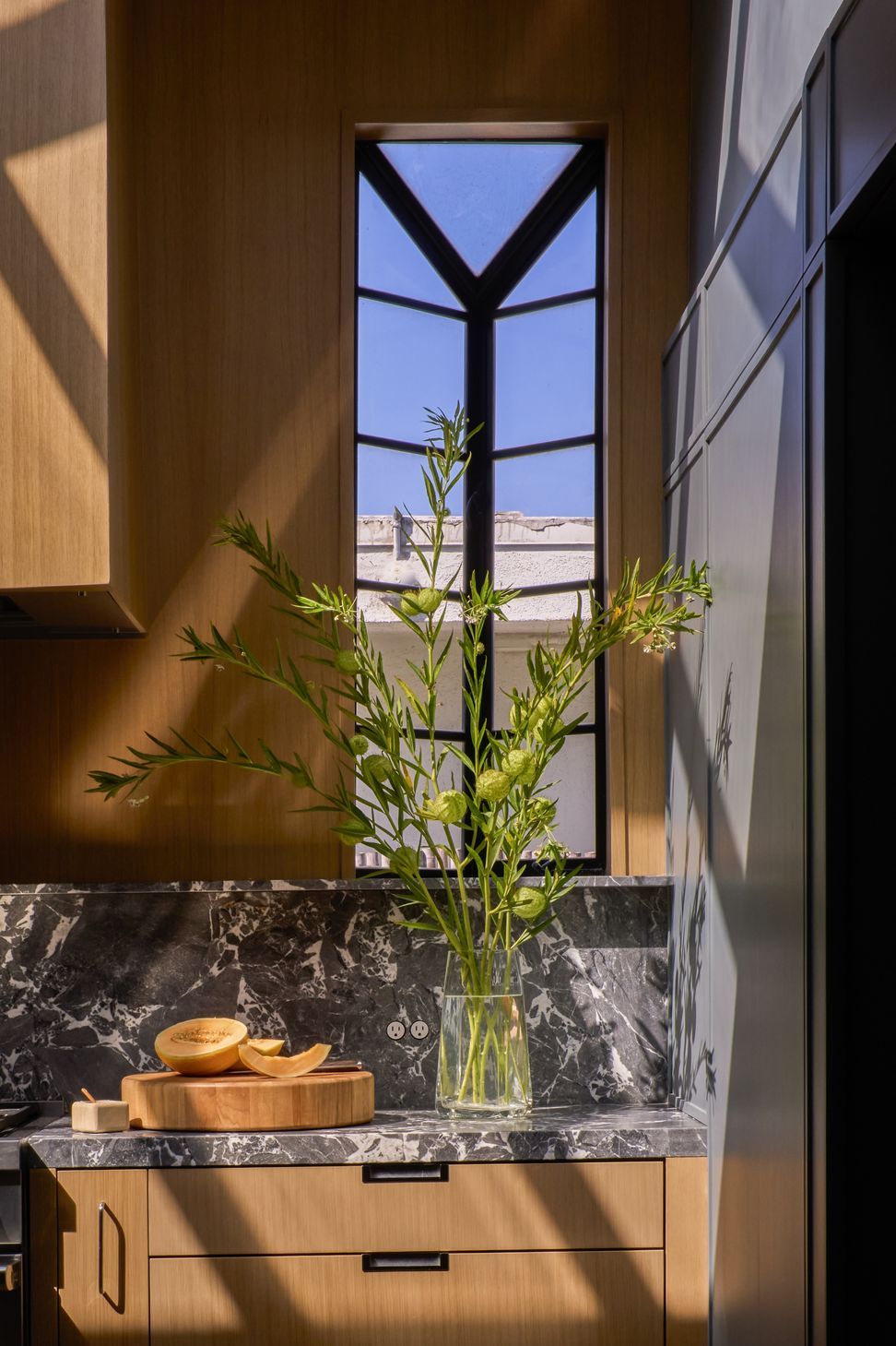 dona-marta-the-warren-interior-design-mid-century-modern-kitchen-steel-window-y-mullion-detail-19-studio-city-ap-compressed.jpg