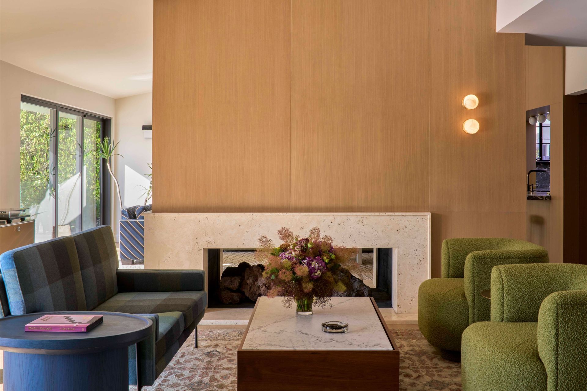 dona-marta-the-warren-interior-design-mid-century-modern-living-room-double-sided-travertine-fireplace-wide-32-studio-city-ap-compressed.jpg