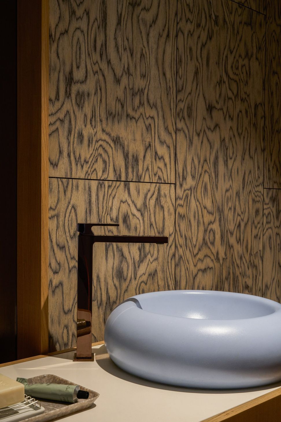 dona-marta-the-warren-interior-design-mid-century-modern-powder-room-lavender-sink-copper-faucet-detail-03-studio-city.jpg