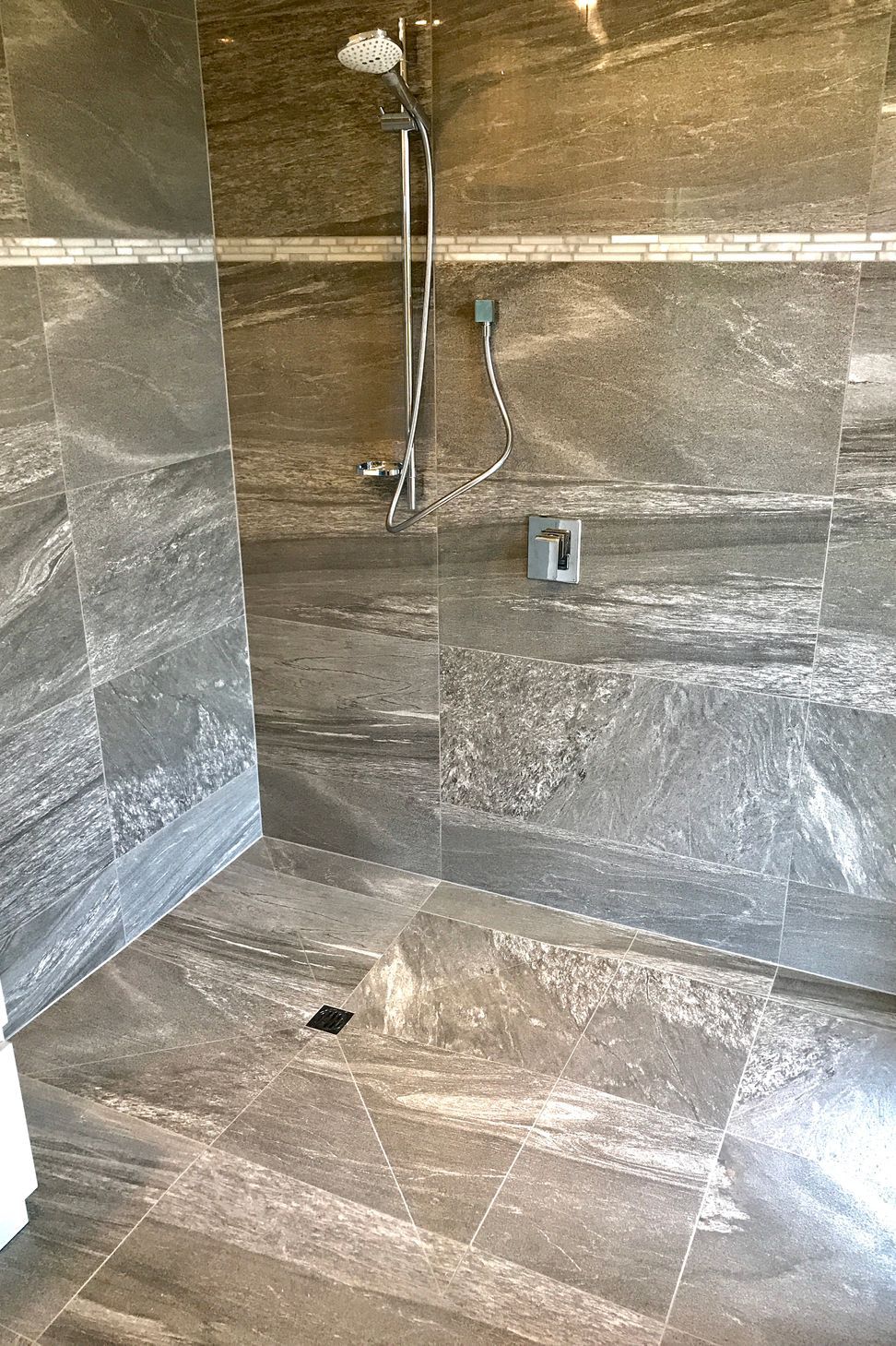Tiled shower floor &amp; walls