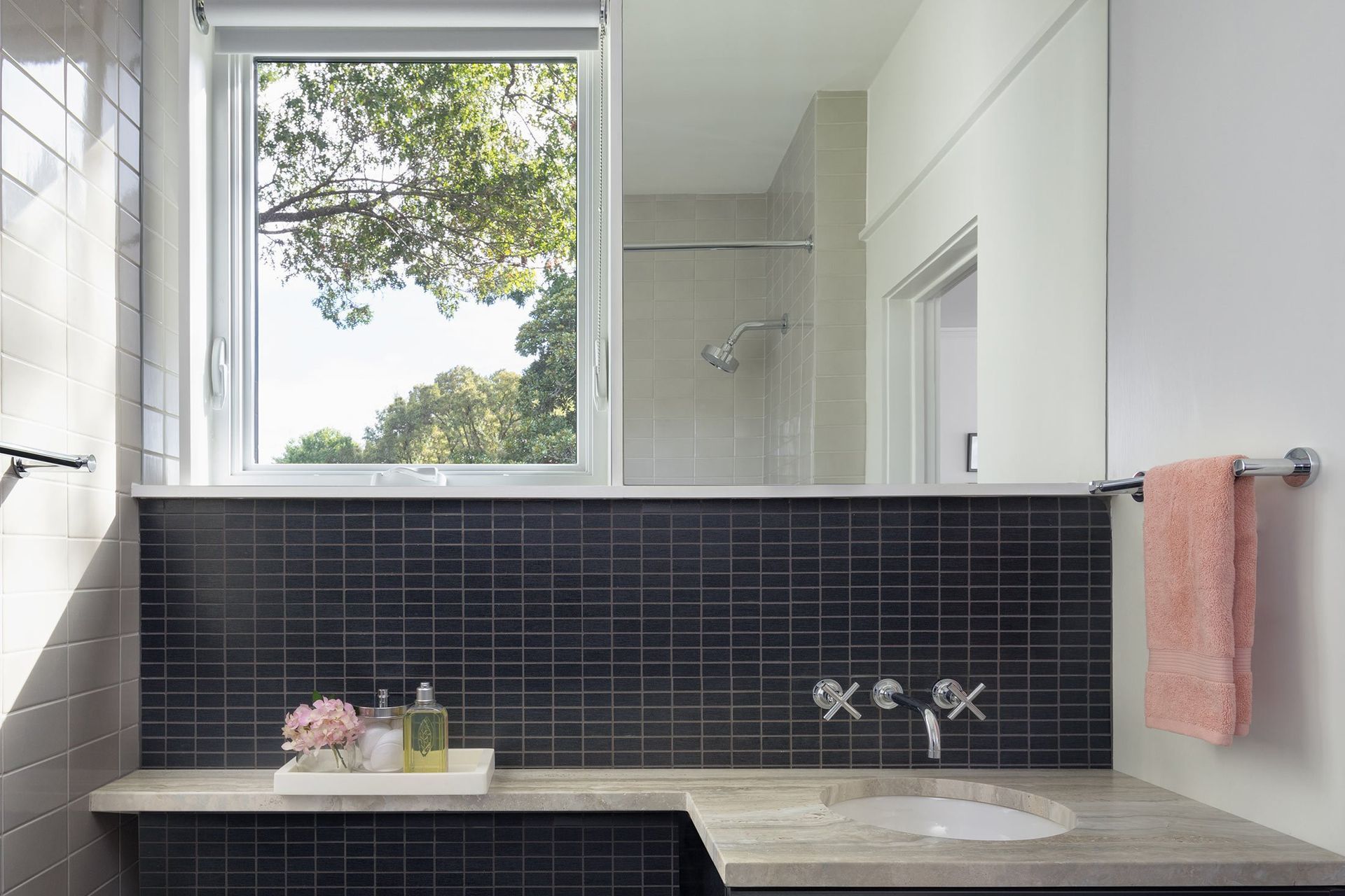 10HeritageOakCottageCuppettKilpatrickArchitectureandInteriorDesignaustin-tx-modern-bathroom-natural-light-dark-tiles-mirror.jpg