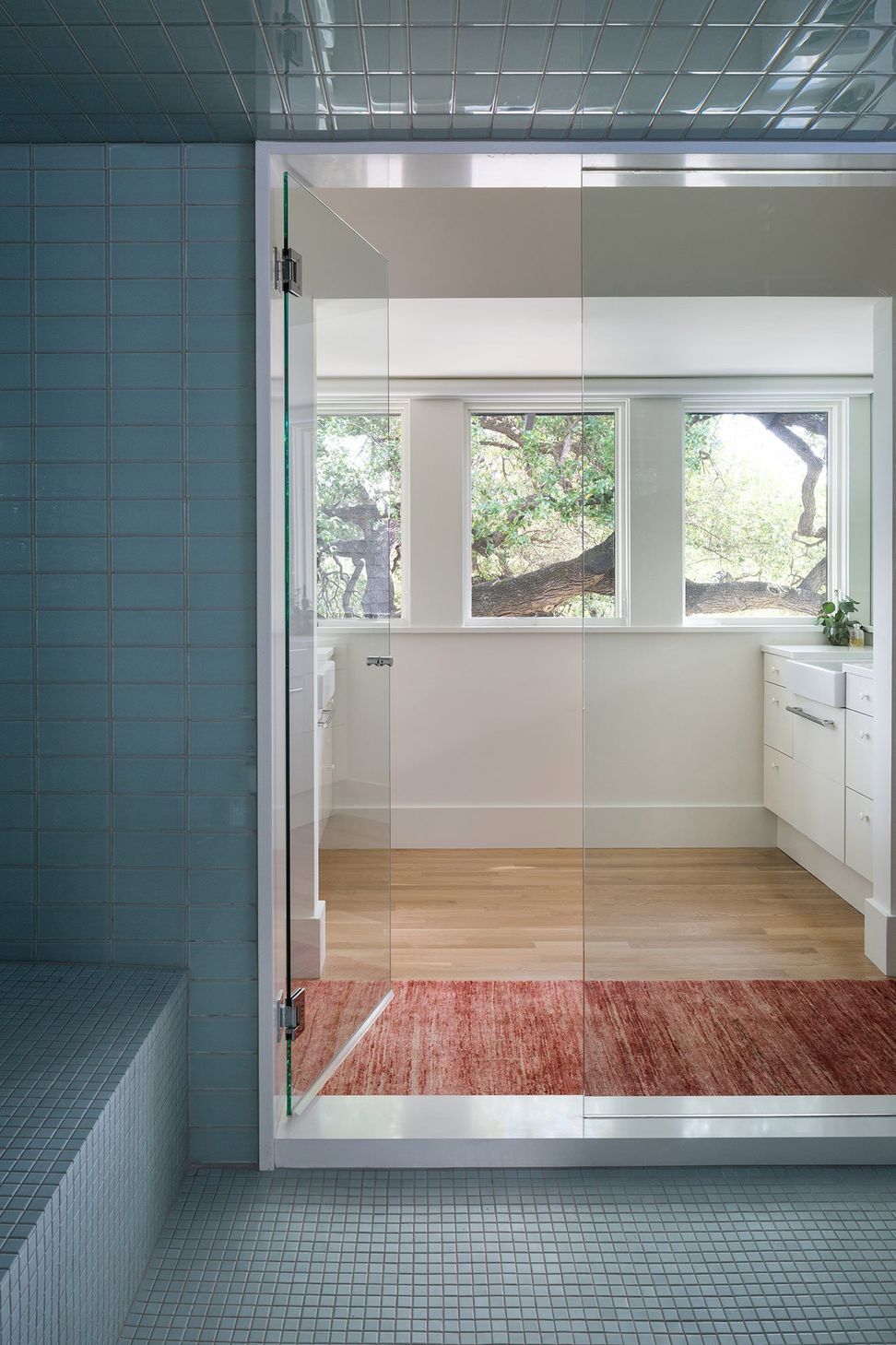 12HeritageOakCottageCuppettKilpatrickArchitectureandInteriorDesignaustin-tx-modern-bathroom-shower-bench-blue-tiles.jpg