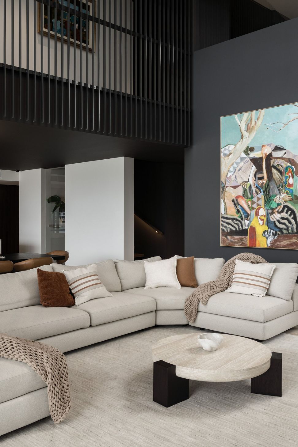 Carwoola House - Living Room. Lounge with a modular sofa and bold artwork.