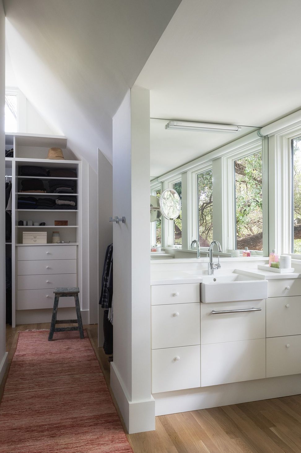 13HeritageOakCottageCuppettKilpatrickArchitectureandInteriorDesignaustin-tx-bathroom-vanity-to-closet-large-mirror.jpg