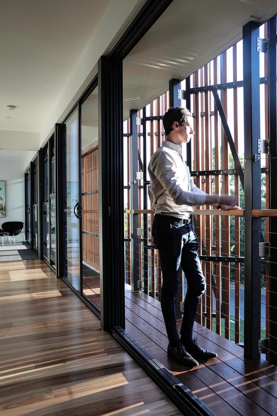 Glennon Residence - Living Room. Sliding the timber screens across the glazing.