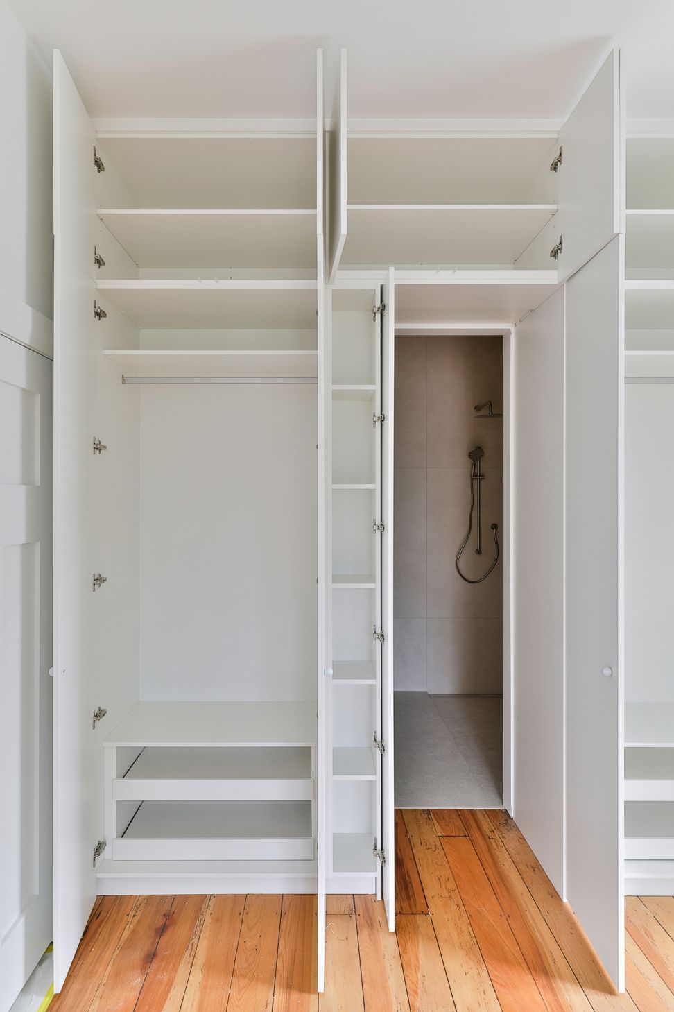 Custom wardrobe with hidden ensuite access