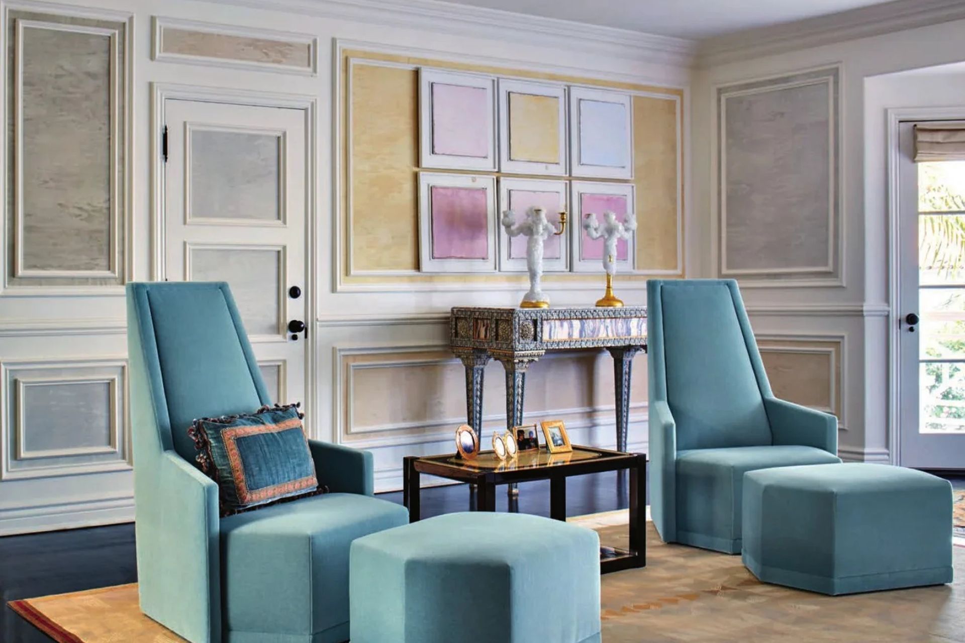elegant-sitting-room-turquoise-chairs-pastel-art-paneled-wallswebp-ap-compressed.jpg