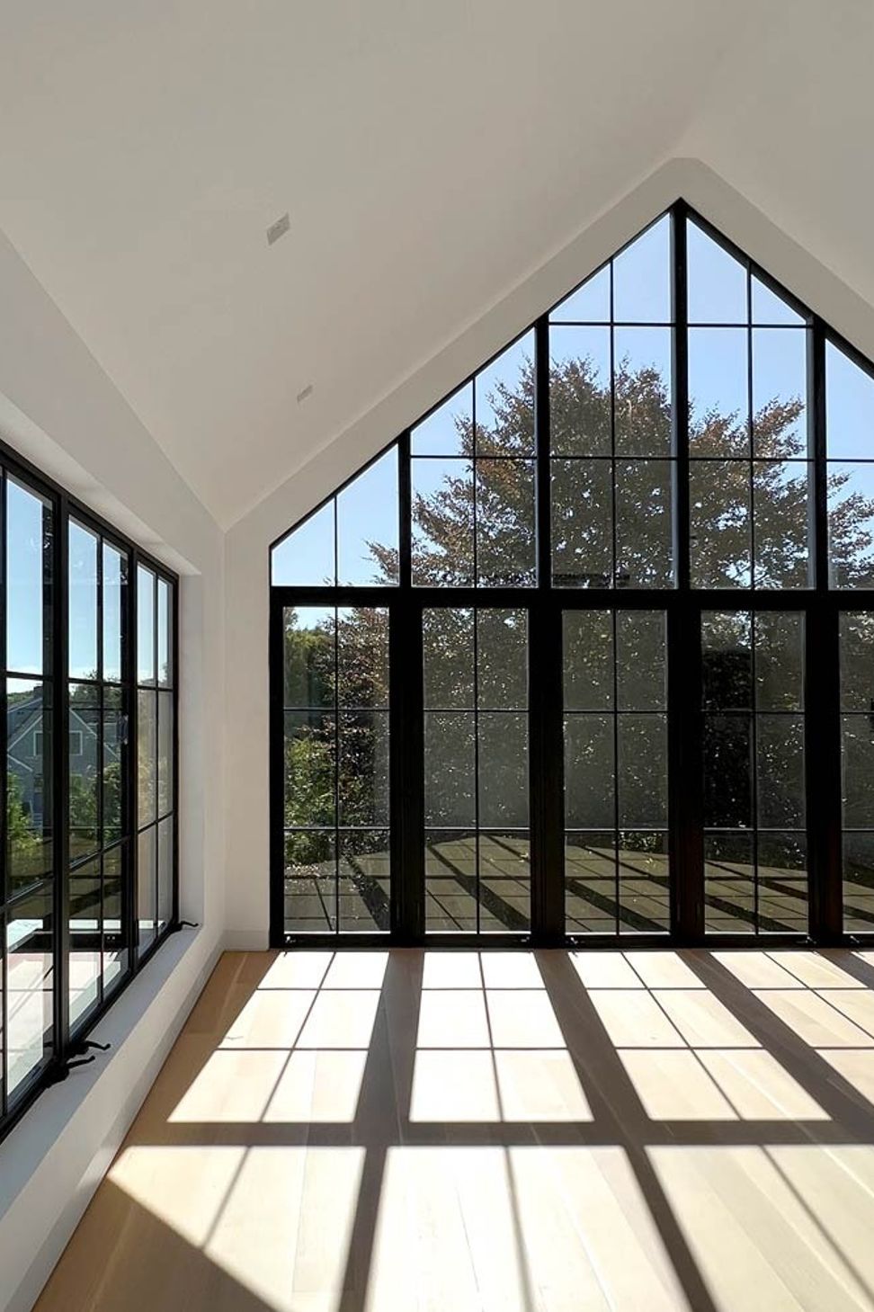 imgi16farmhouse-style-glass-gable-bedroom-interior-in-modern-home.jpg