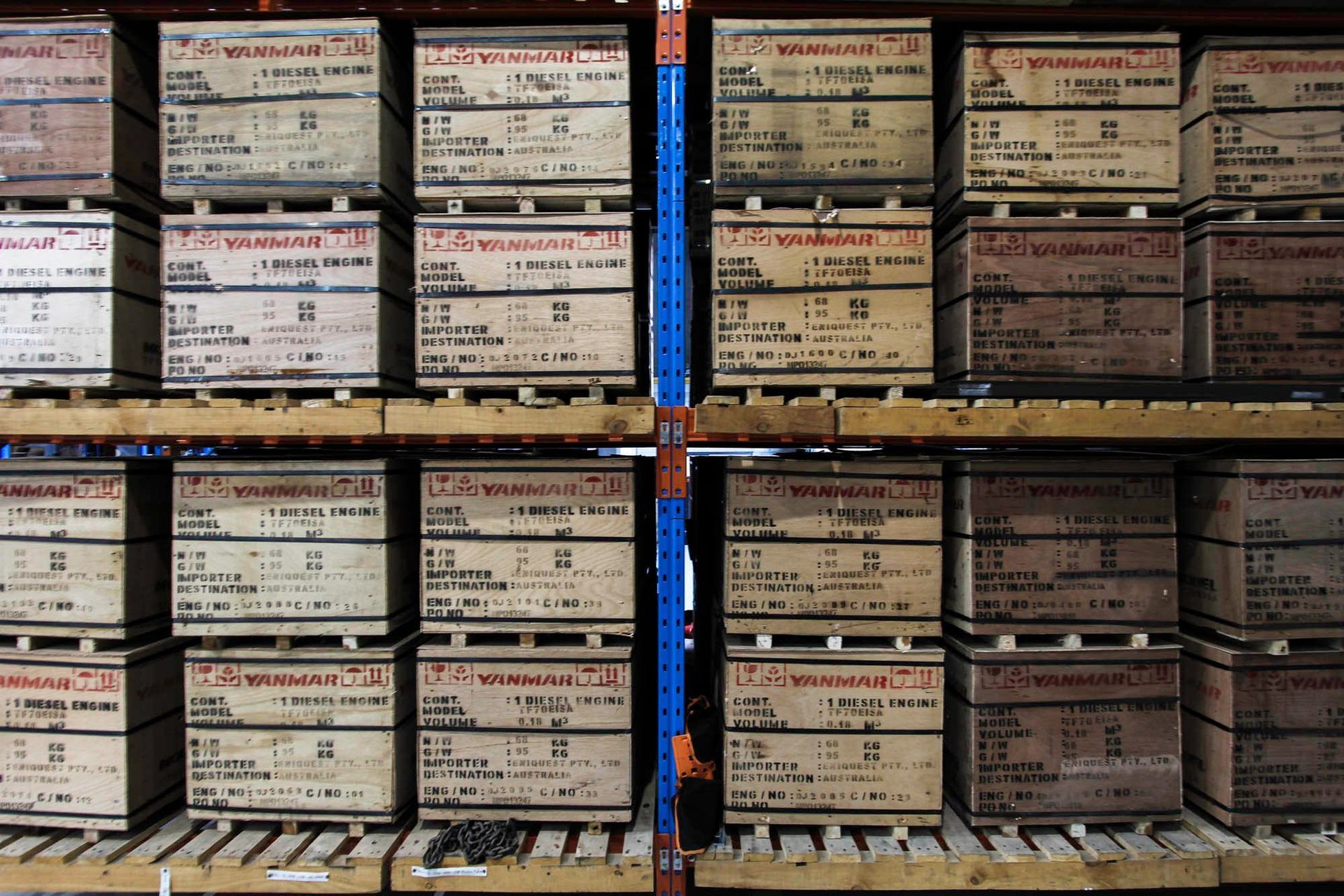 Eniquest Warehouse - Warehouse. Timber crates stacked on pallet racking.