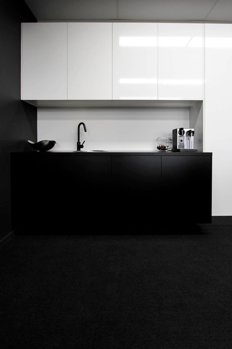 Eniquest Warehouse - Kitchen. Black kitchenette in the office.