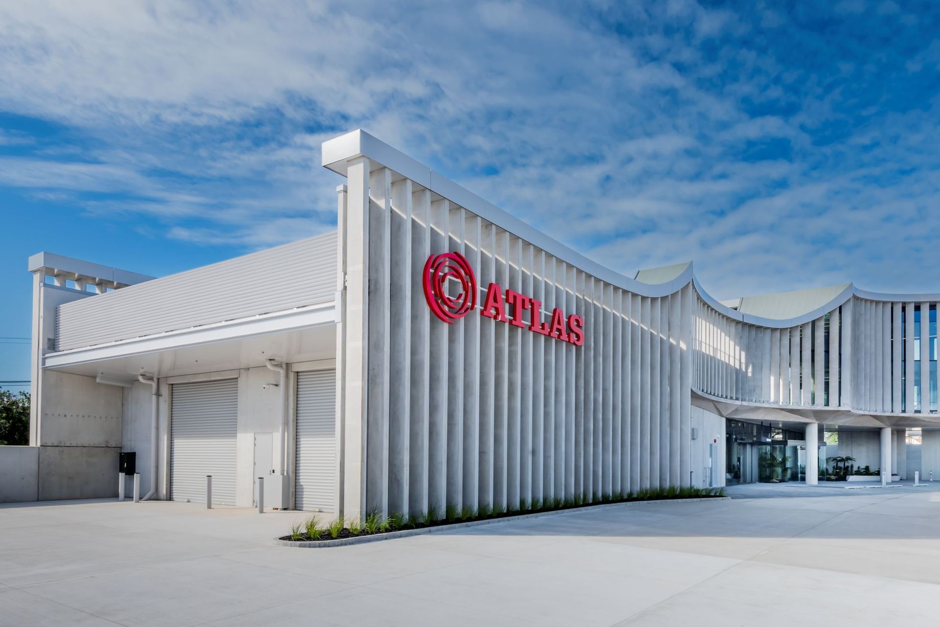 The design brief was to explore the efficient use of the site, replacing an existing retail office with a new headquarters that consolidates Atlas Concrete's trade retail, warehouse, and office into an integrated facility. This unified approach brings the team together in a collaborative environment while serving as a showcase of Greenstone LCC.