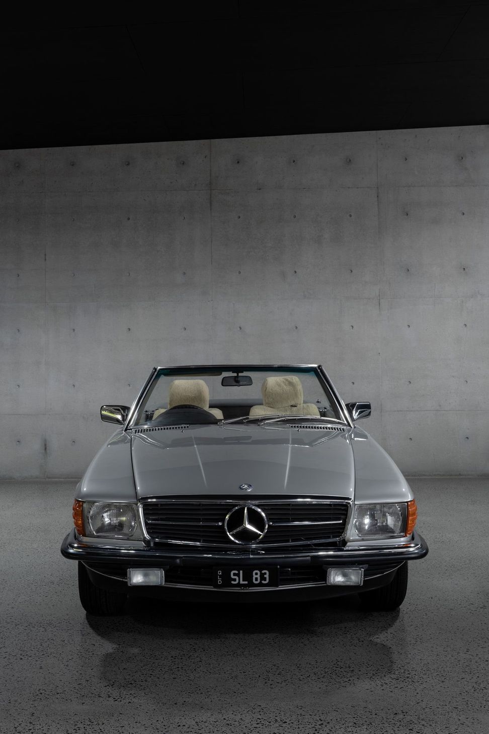The Farm - Garage. Classic convertible on polished concrete.