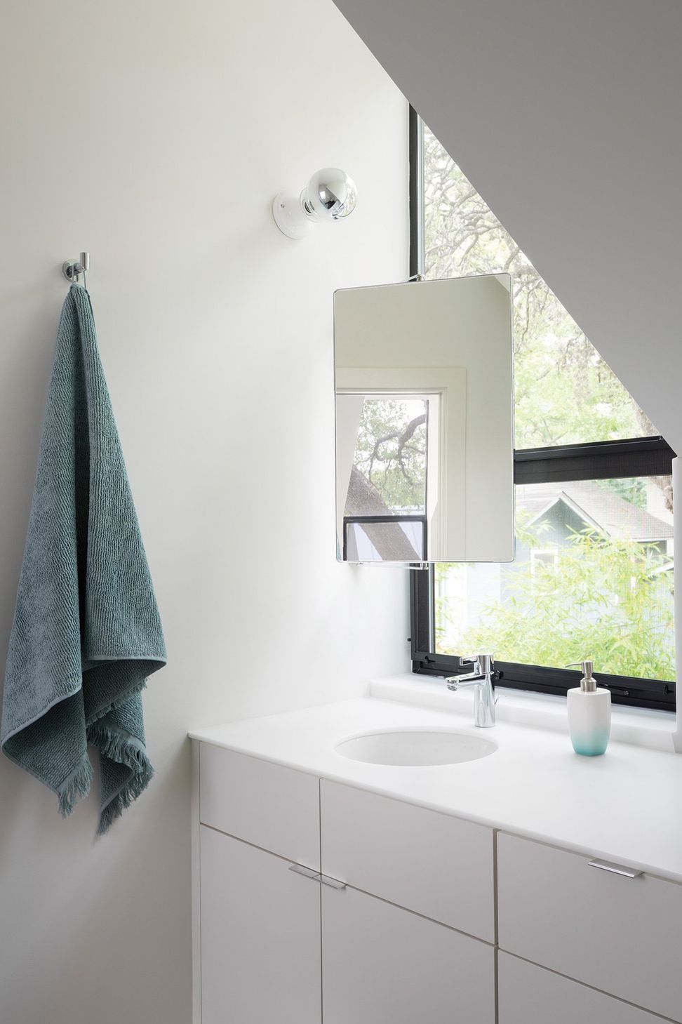 12LittleStacyParkCuppettKilpatrickArchitectureandInteriorDesignaustin-tx-minimalist-bathroom-vanity-window-mirror.jpg