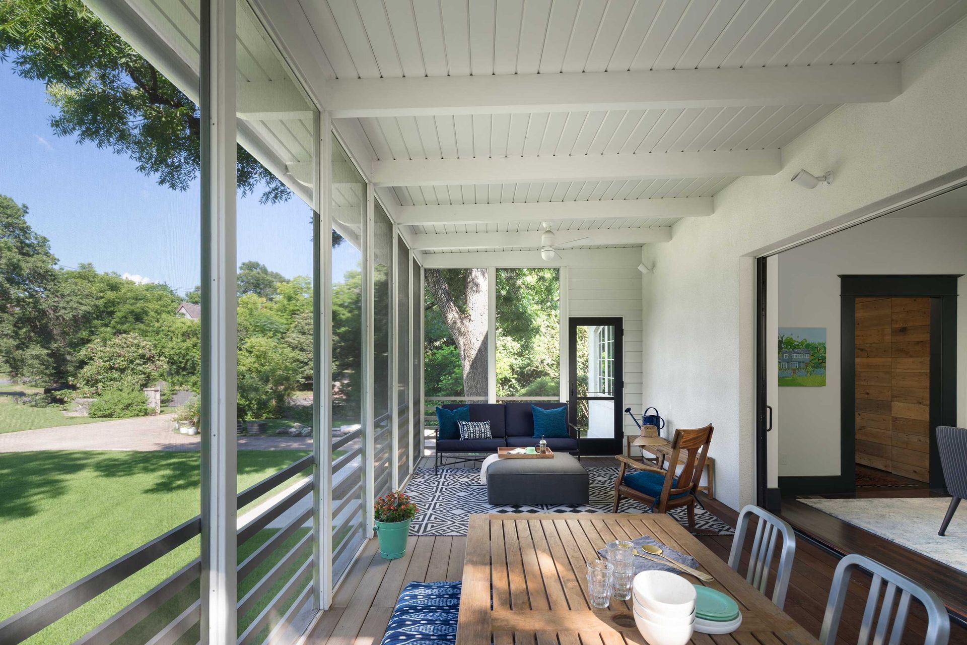 4TransformationinHemphillParkCuppettKilpatrickArchitectureandInteriorDesignaustin-tx-screened-porch-interior-wooden-furniture-natural-view.jpg