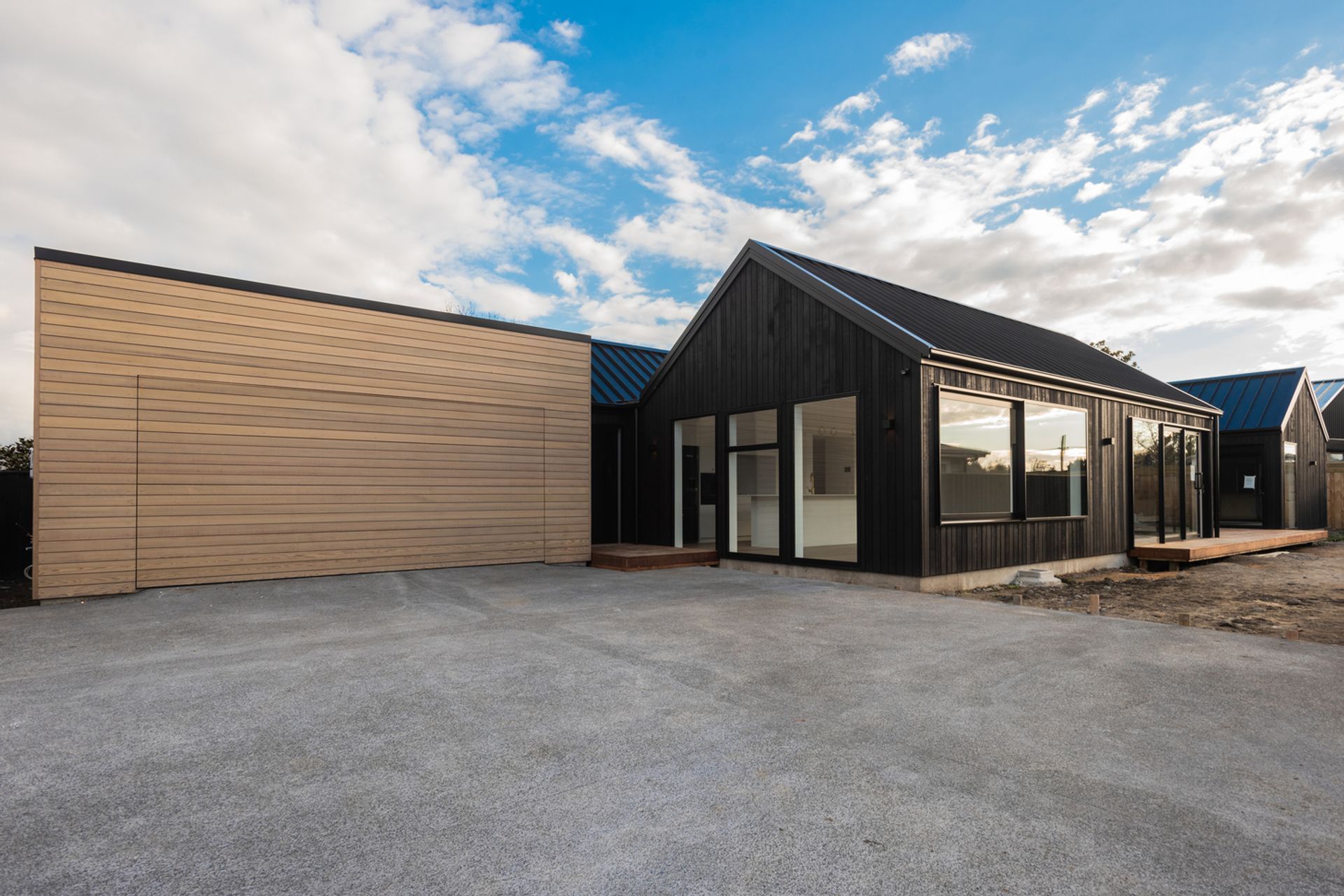 DMC-Projects-Flush-Mount-Door-cladded-in-Hermpac-Cedar-1.jpg