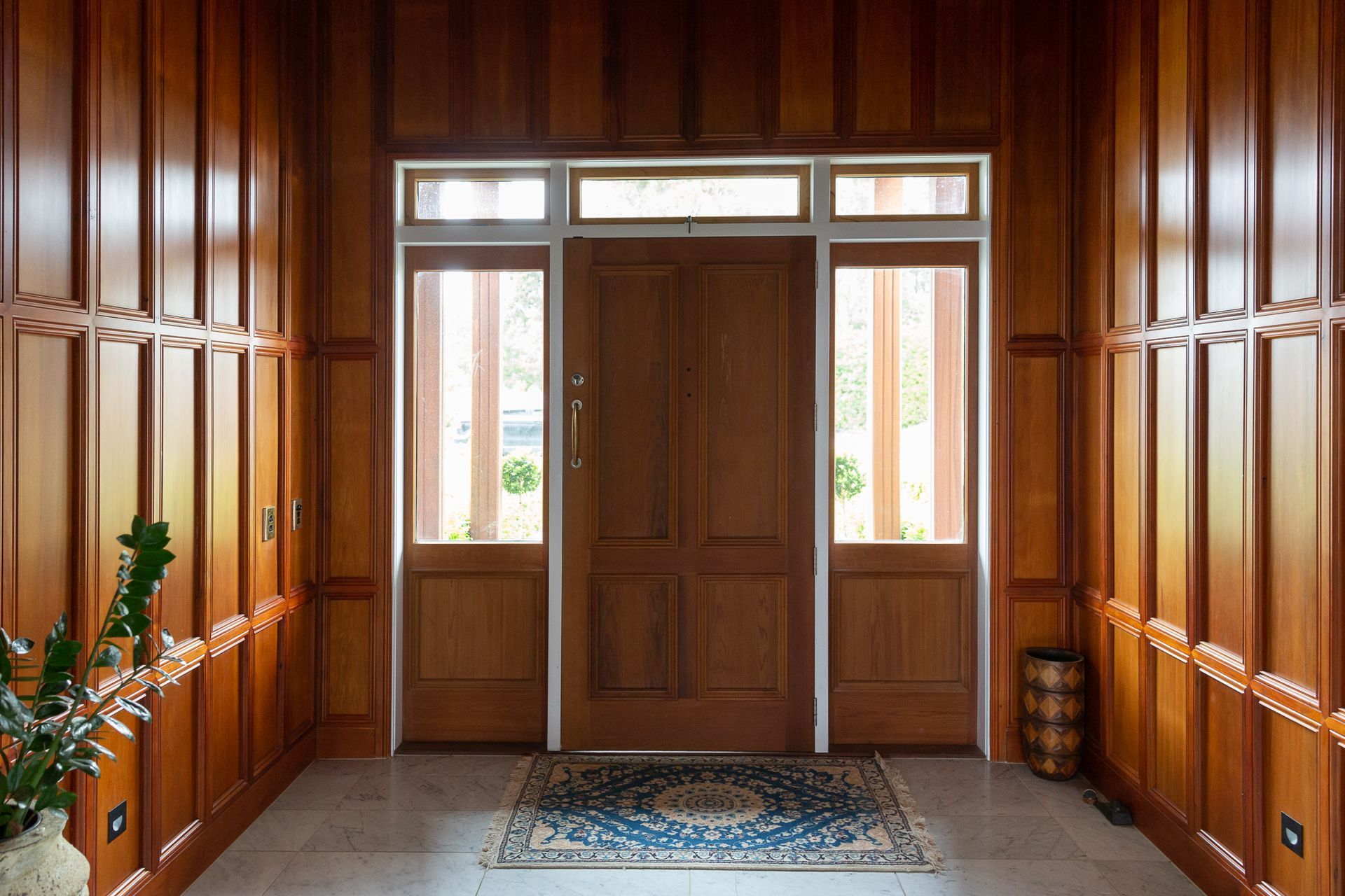 The paneling in the entrance is an absolute show stopper.  The moldings used are produced by our amazing team to add a touch of magic to this hallway.