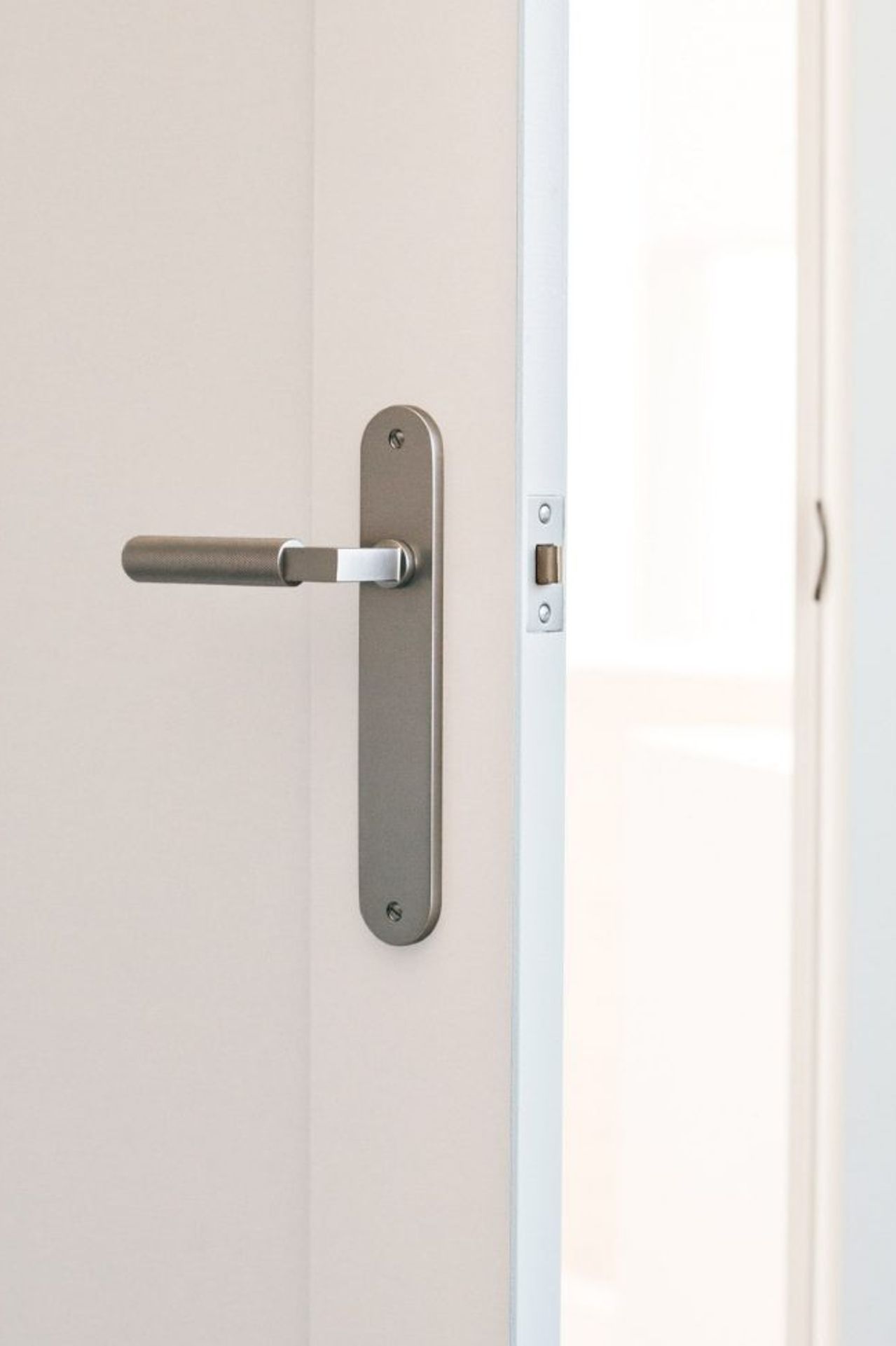 Kyal-Karas-Brunswick-Lever-On-Oval-Backplake-Satin-Nickel-3.jpeg