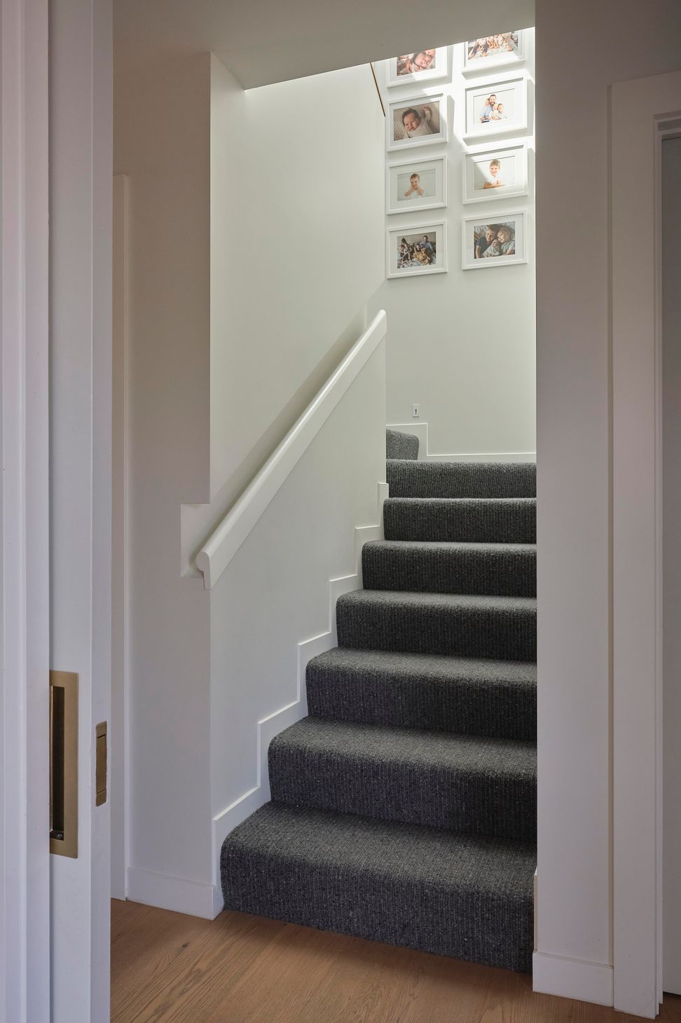 Pop-TopView-of-stairway-with-light-streaming-in-from-the-skylightSam-Hartnett-Photographer8.jpg