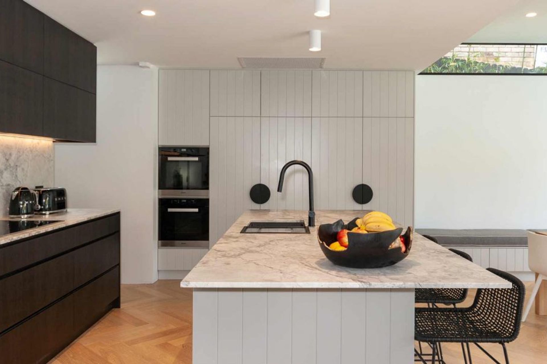 dulux-polyurethane-v-groove-grey-dark-kitchen-design-miele-smeg-butlers-pantry-banquet-seating-7159-1-1084x609.jpg