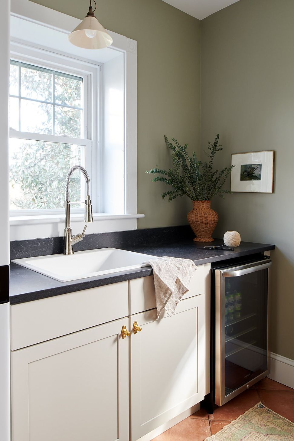 laundry-room-drink-fridge-sink-dark-marble-counter-sharp-and-grey-interiors.jpeg