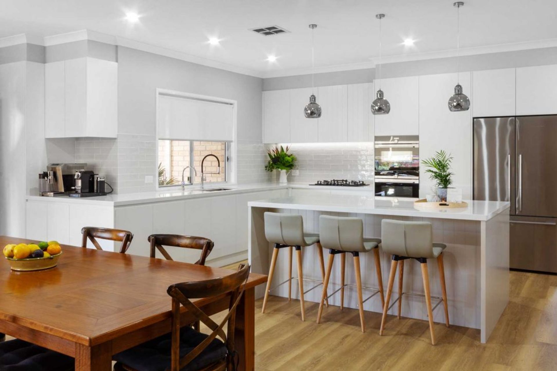 modern-kitchen-design-sydney-white-kitchen-bosch-fisher-paykel-dulux-silestone-siemens-zip-tap-3-1084x723.jpg