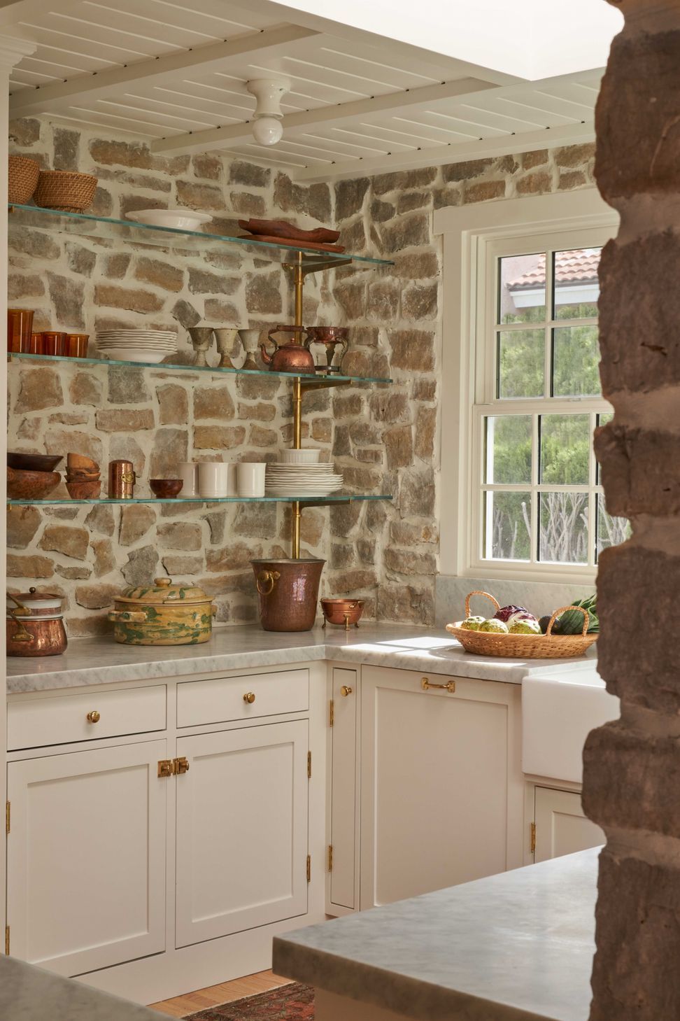 the-warren-linda-vista-english-cottage-kitchen-open-shelving-cobblestone-walls-02.jpg