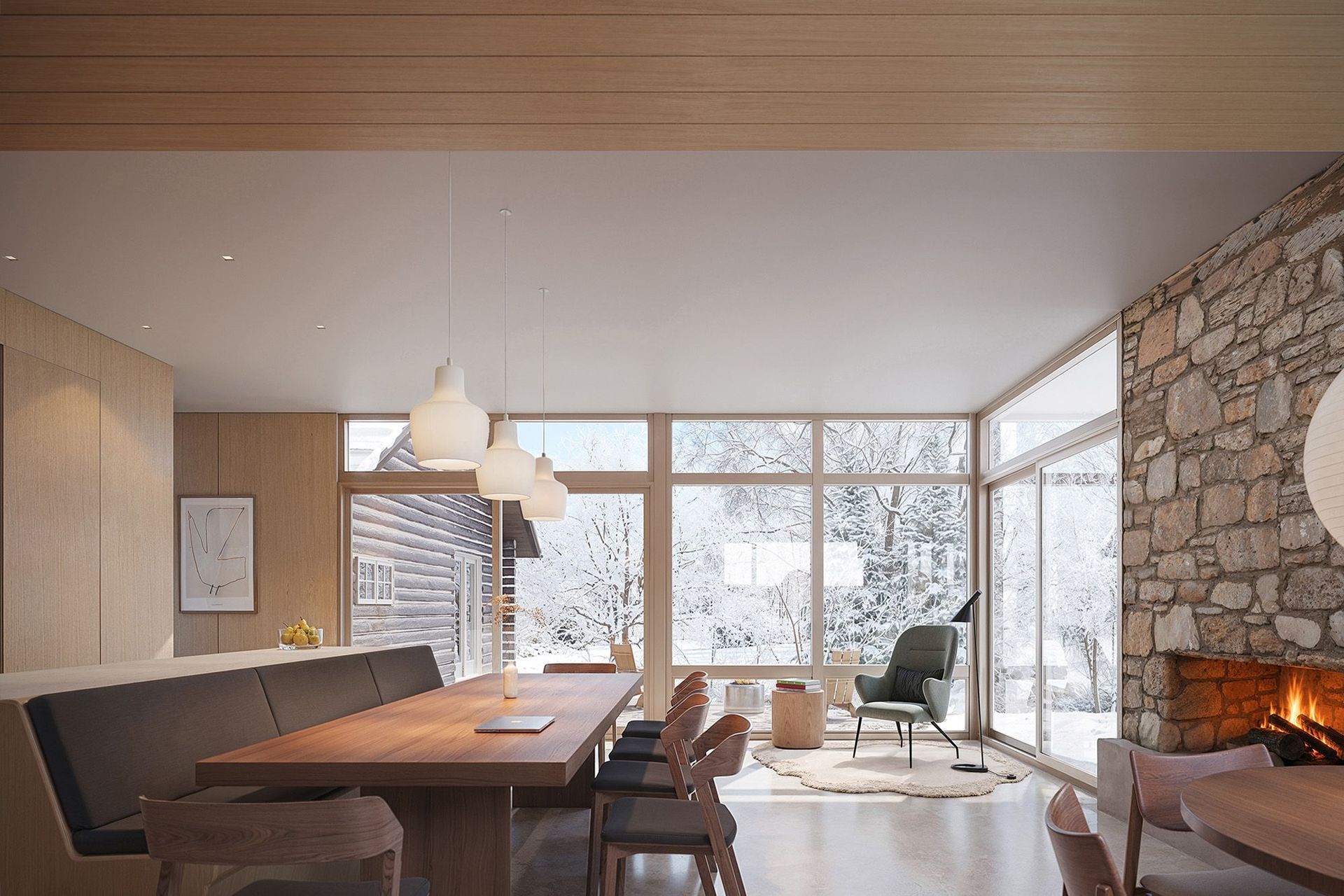 trimmer-road-interior-dining-stone-fireplace-moden-cabin-snow.jpg