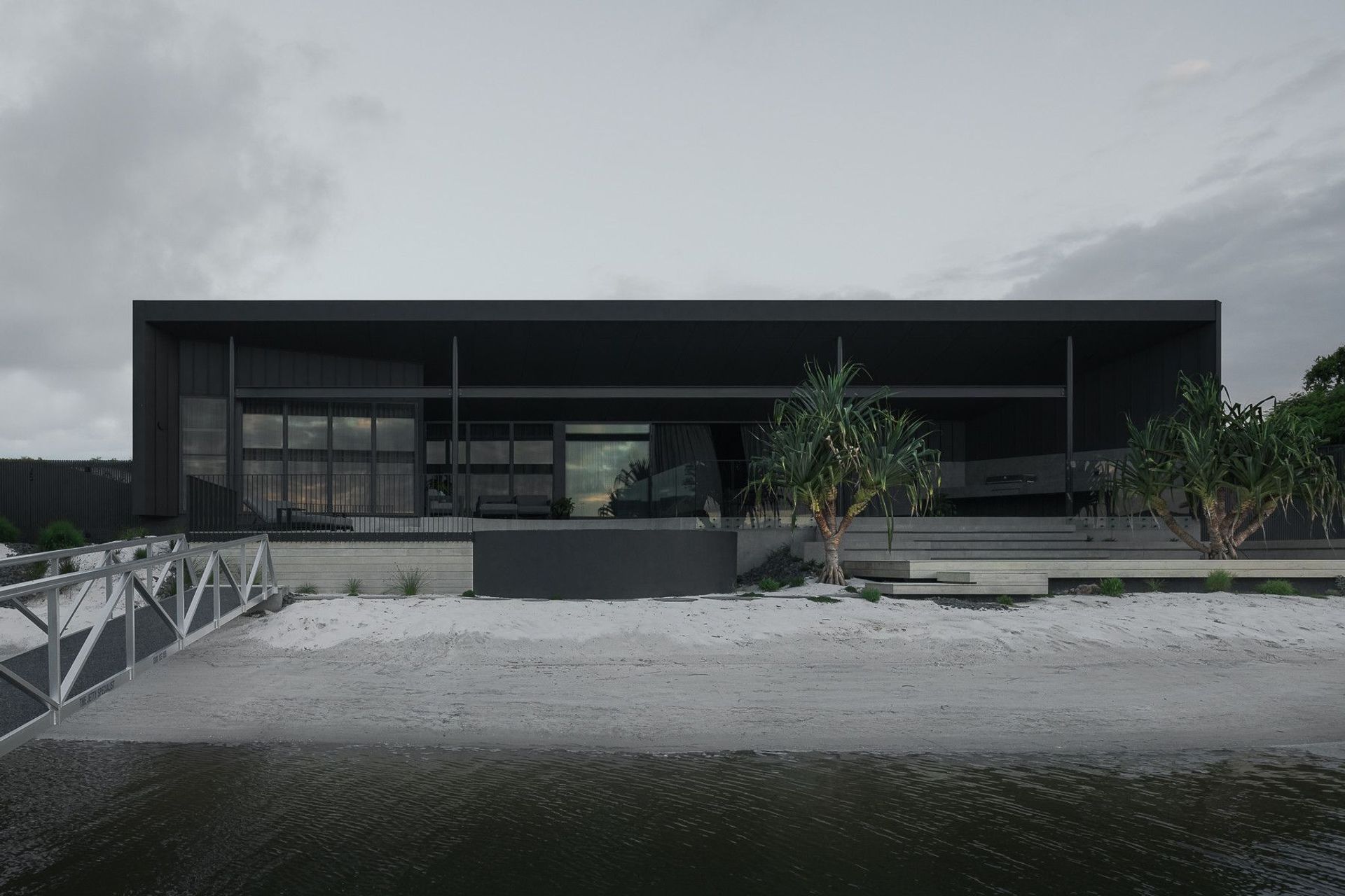 0042 Residence - Exterior. The home from the canal, with its private beach and jetty.