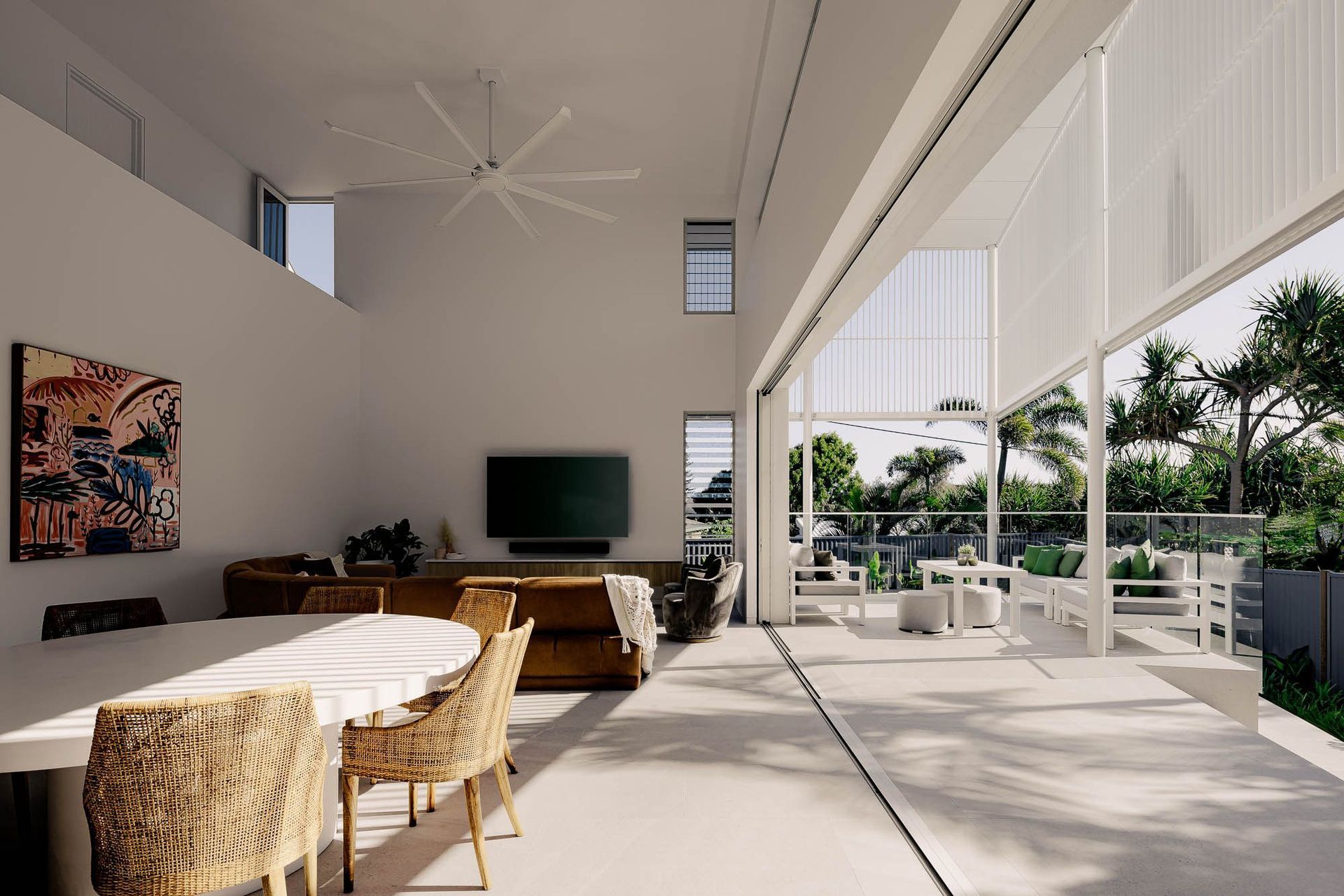 Zaremba Residence - Living Room. Double height living space with a timber dining table and garden views.