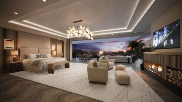 Luxurious open-plan bedroom and lounge with a contemporary built-in fireplace, layered recessed ceiling lighting, timber wall panelling, large rug, sculptural pendant light, and floor-to-ceiling glazing opening toward a sunset view. A bed occupies the left side, while upholstered lounge seating and a television are arranged around the fireplace on the right.