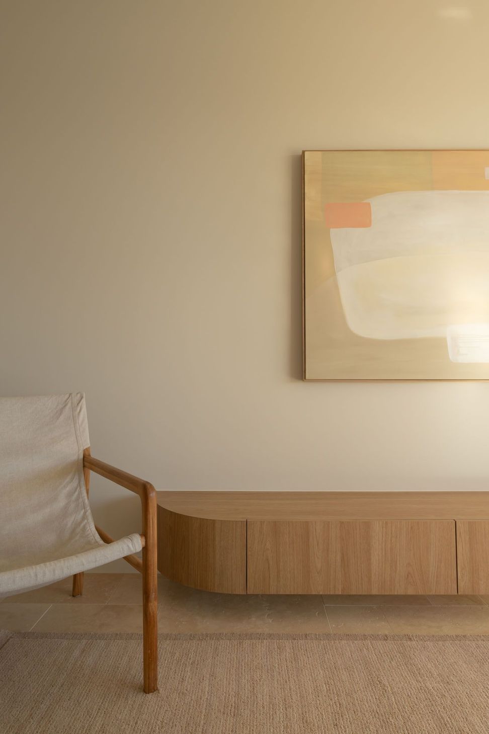 Warrego - Living Room. Abstract artwork above a low timber console.