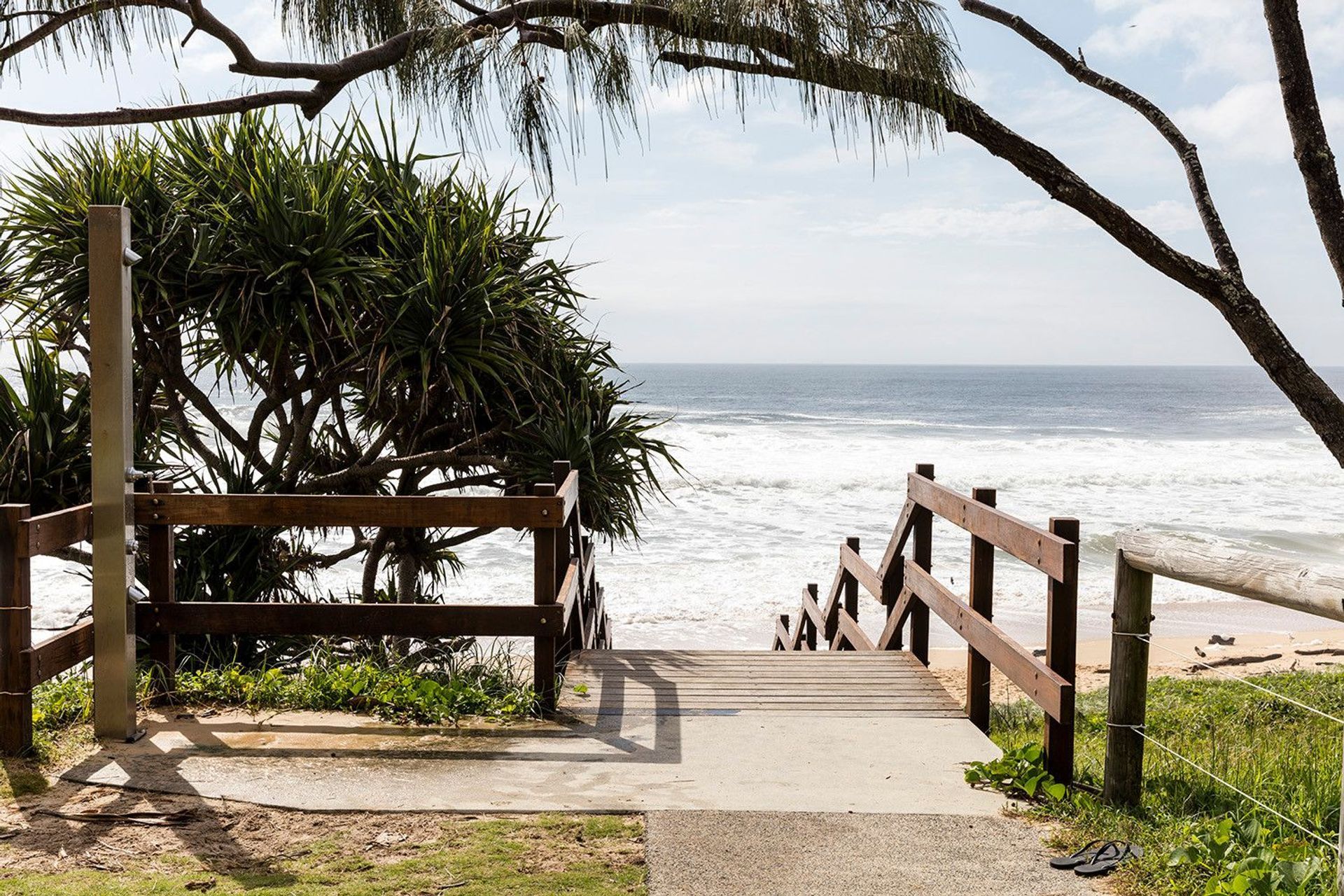 Morrison Residence - Exterior. Beach access path through pandanus.