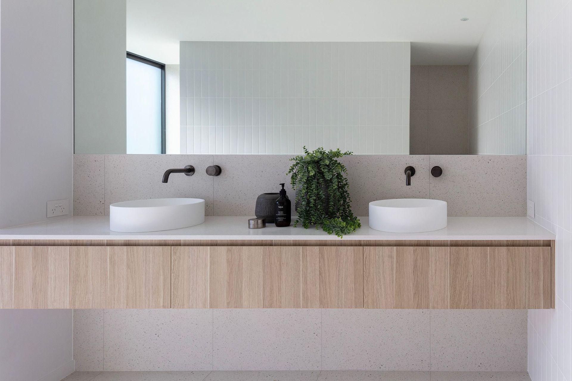 Bells Esplanade - Bathroom. Floating timber vanity with twin basins.