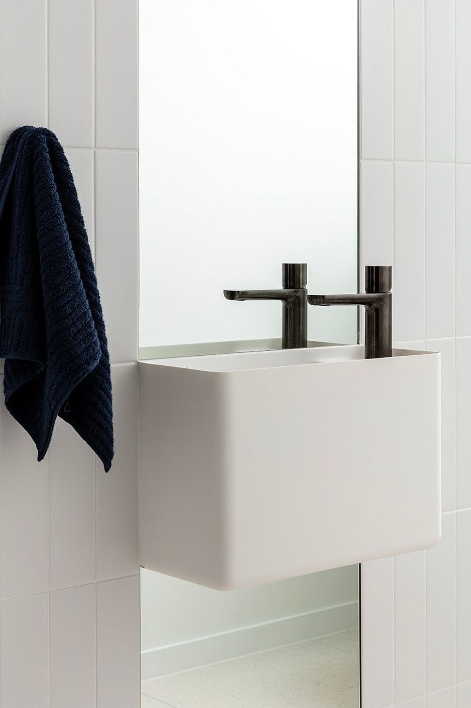 Bells Esplanade - Bathroom. Square basin with black tapware.