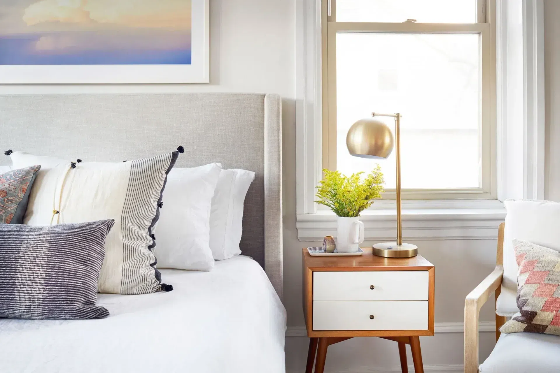 sharp-and-grey-interiors-bedroom-nightstand-upholstered-bed-mid-century-nightstand.webp
