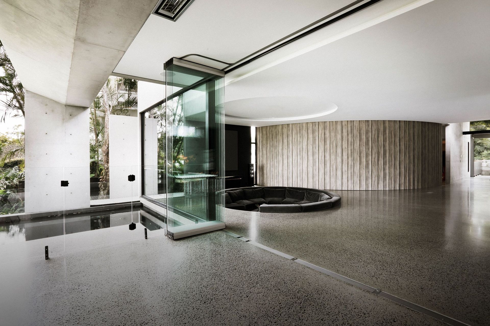 McGovern Residence - Bathroom. Sunken bath with views to the garden courtyard.