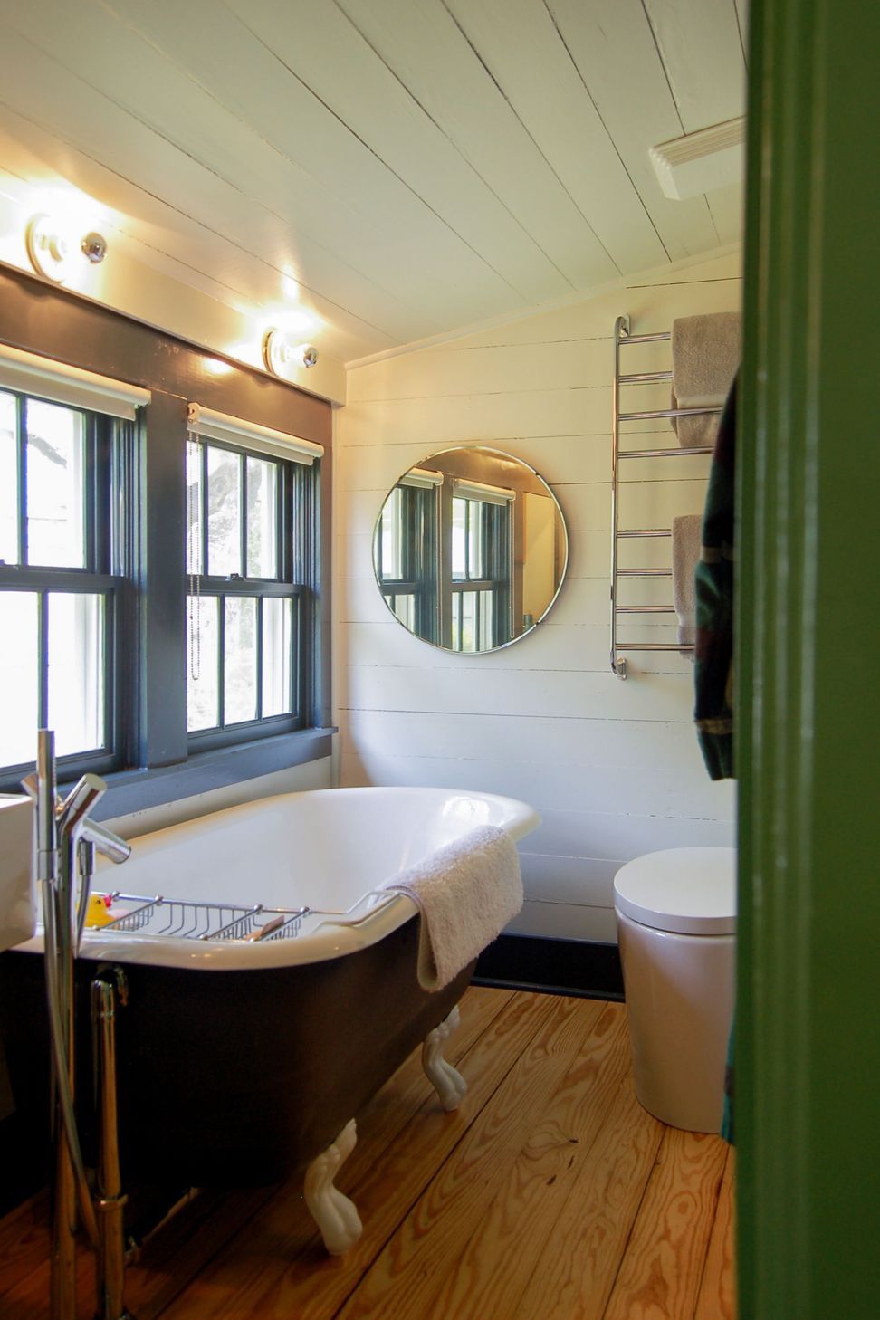 9Historic-HouseCuppett-Kilpatrick-Architecture-and-Interior-Designaustin-tx-bathroom-clawfoot-tub-sloped-ceiling.jpg