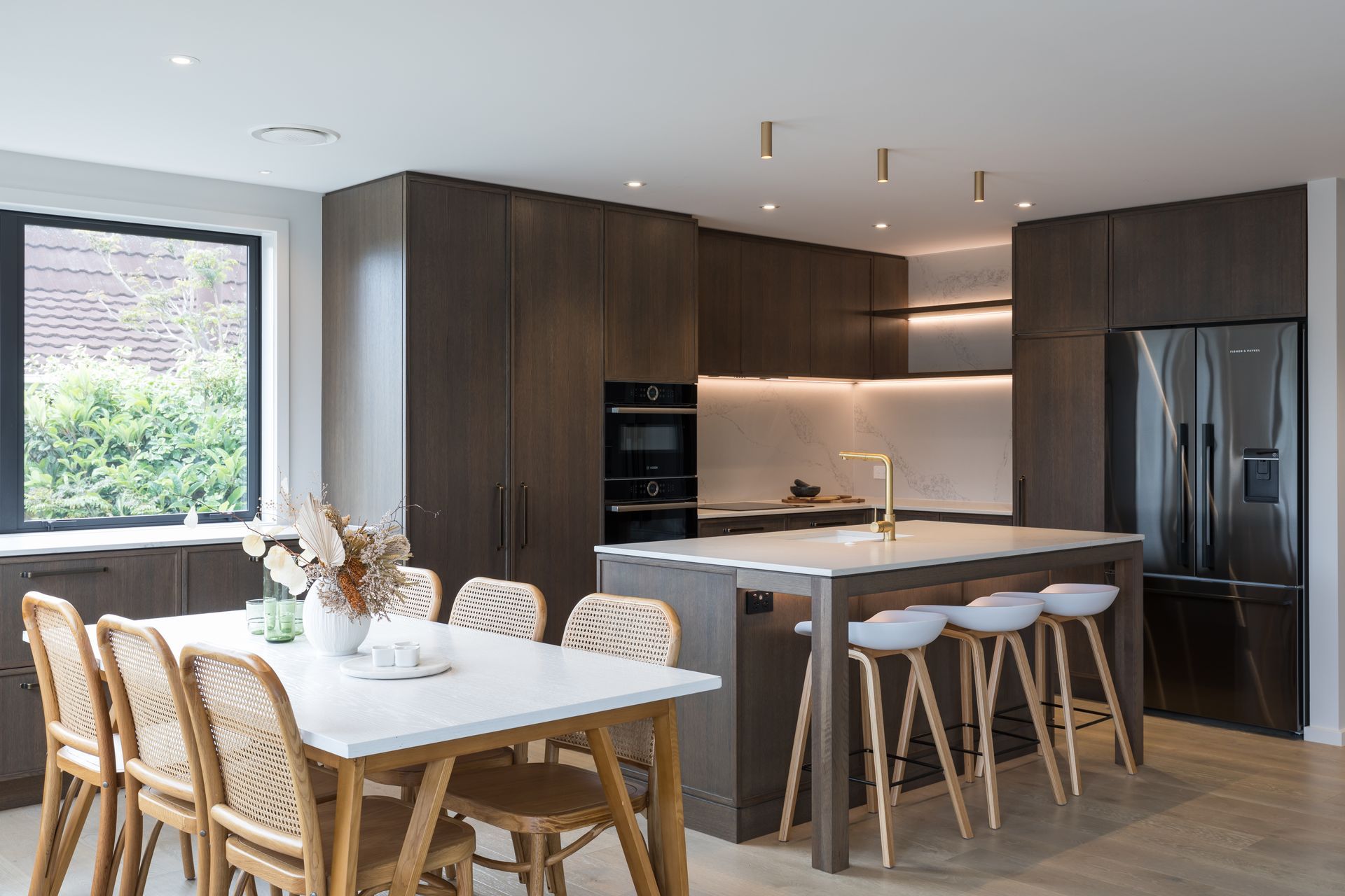 Prime Stone, Calacatta Formosa - Honed / Prime Veneer, American White Oak - Quarter Cut. Design by Susan Lands, Stratford Interior Design.
