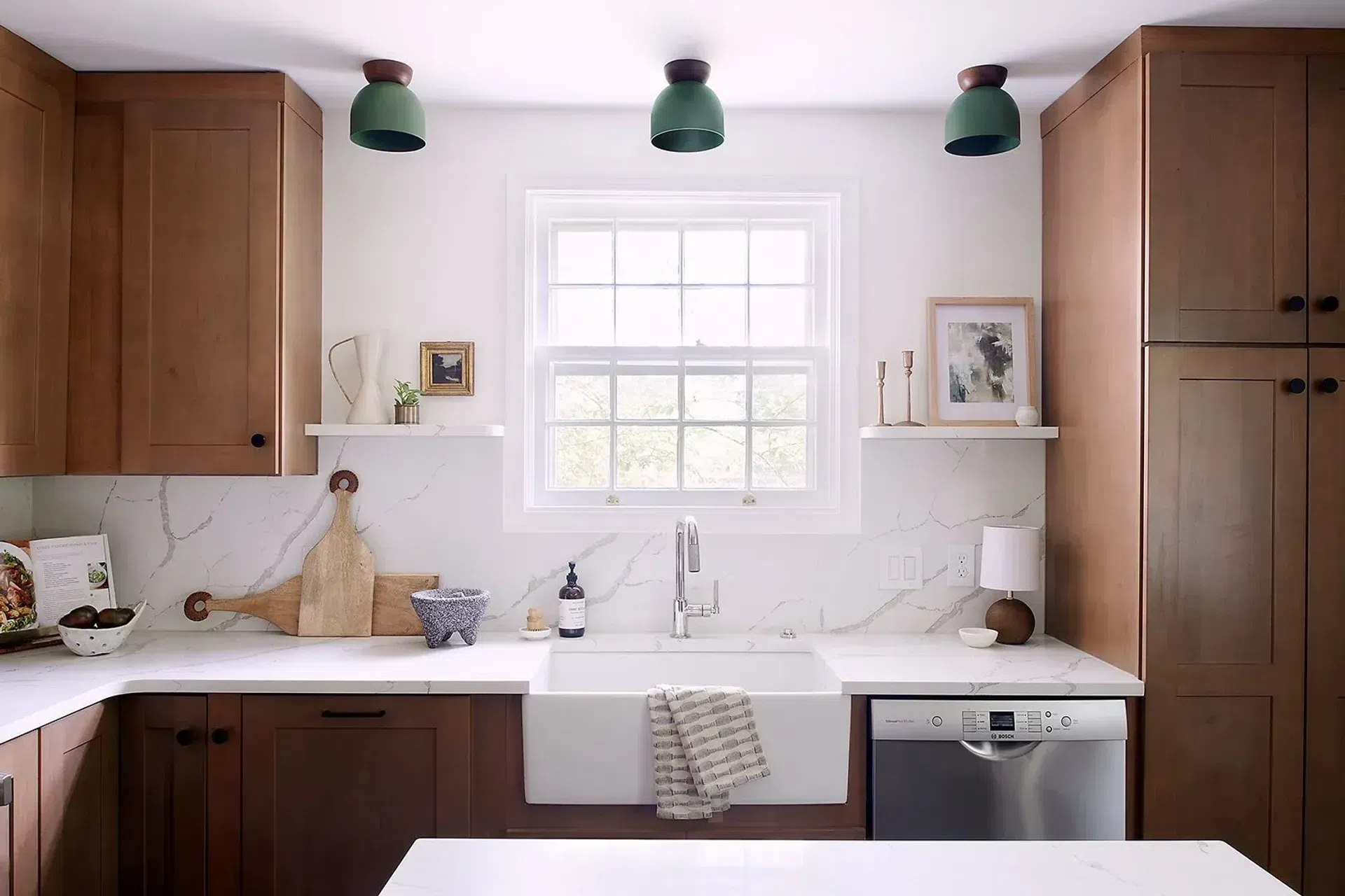 kitchen-remodel-wyncote-glenside-main-line-pa-marble-backsplash-wood-cabinets-green-flush-mount-lighting-farmhouse-sinkjpg.webp
