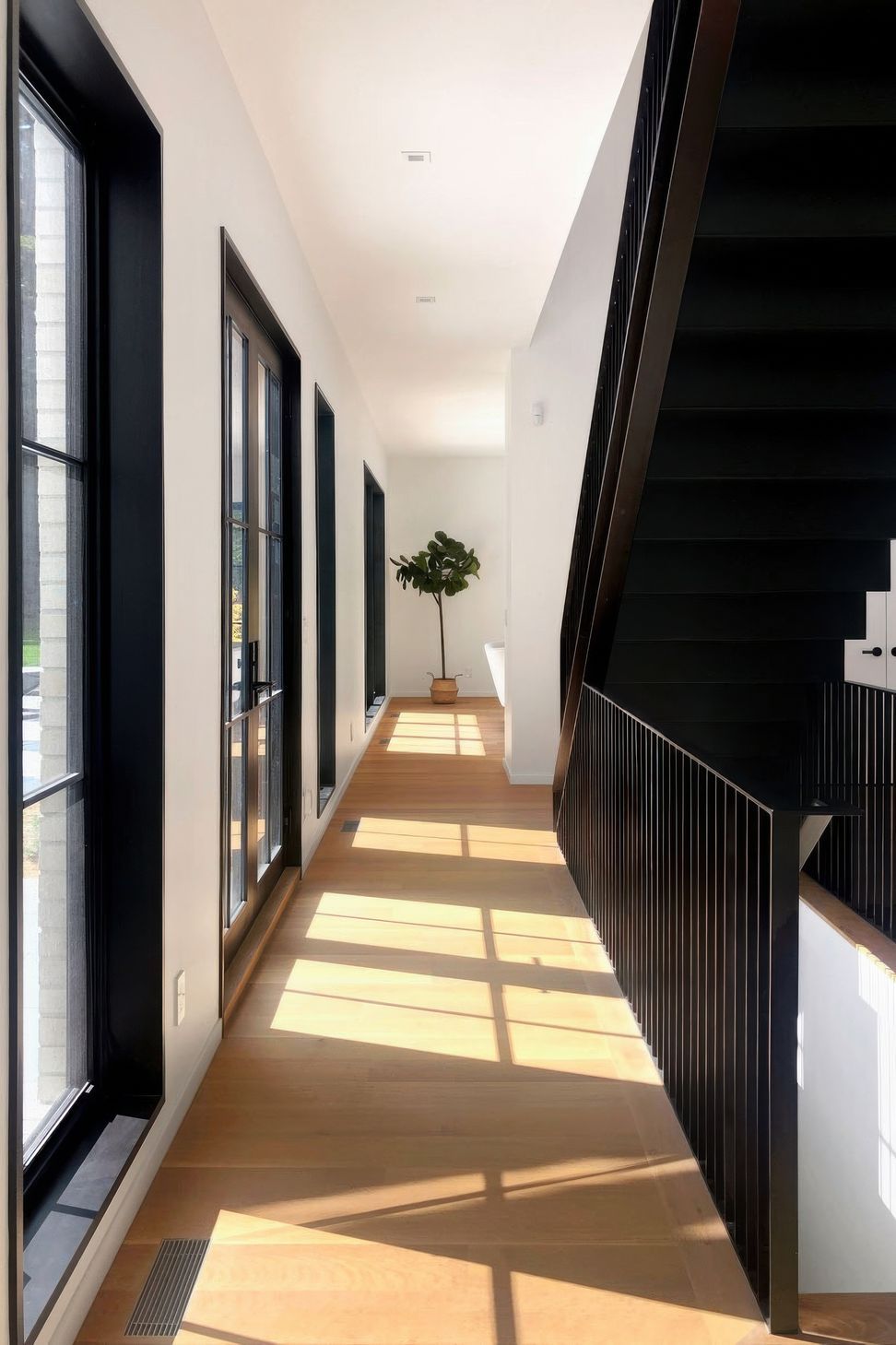 imgi24custom-blackened-steel-modern-staircase-by-long-island-architects-theupstudio-gigapixel-standard-v2-2x.jpg