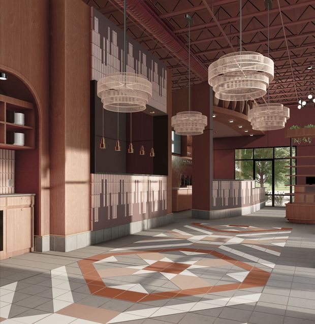 A spacious, richly detailed hospitality interior resembling a restaurant or bar, with deep terracotta and burgundy walls, tall timber-toned columns, patterned geometric tiled flooring, decorative vertical wall detailing, built-in shelving and cabinetry, and multiple large tiered pendant lights. A bar or service counter is visible toward the rear, with full-height glazing opening to greenery outside. The exposed ceiling structure and services contribute an industrial character, softened by warm materials and ornamental lighting.