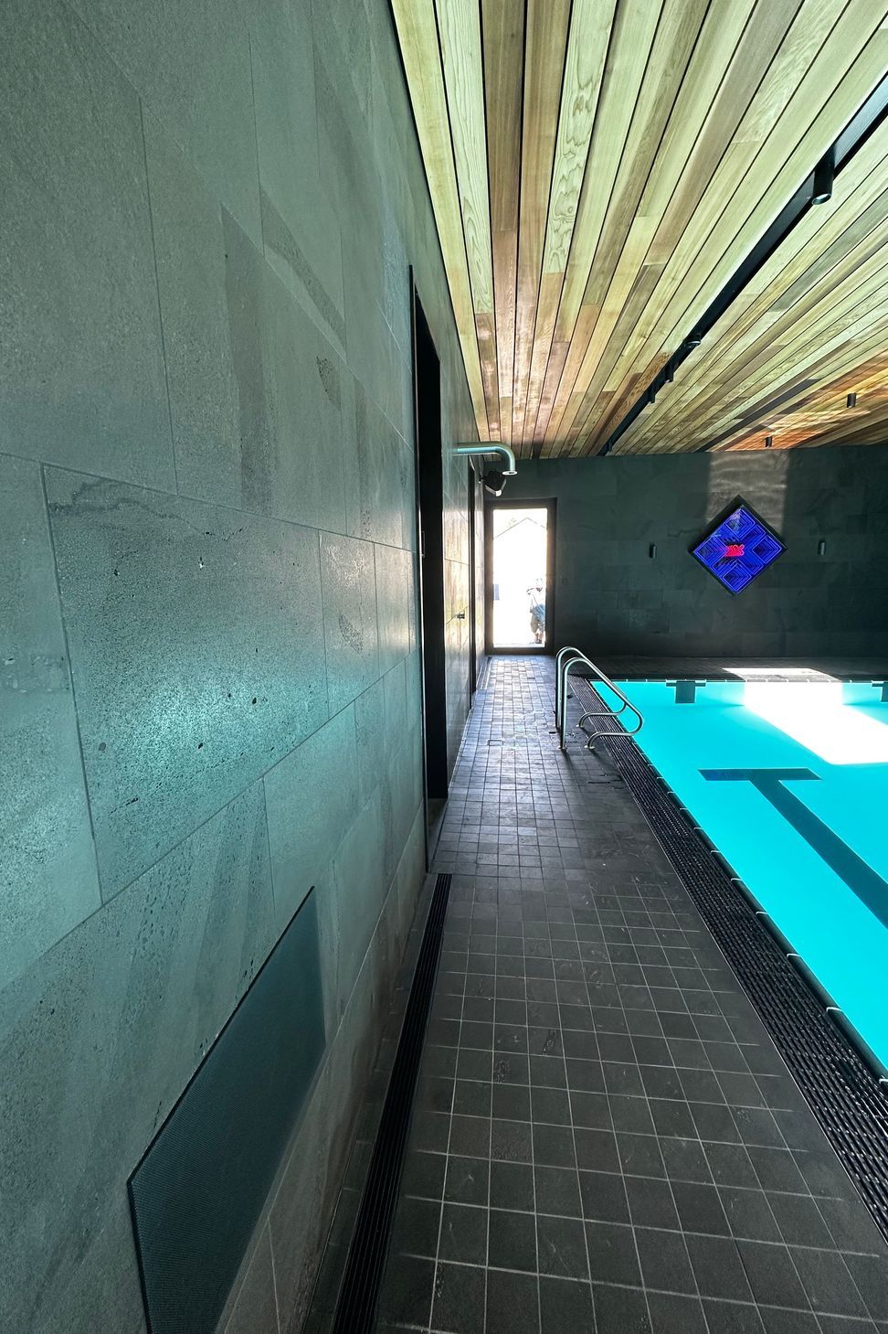 Pool tiling at Speargrass Flat Rd