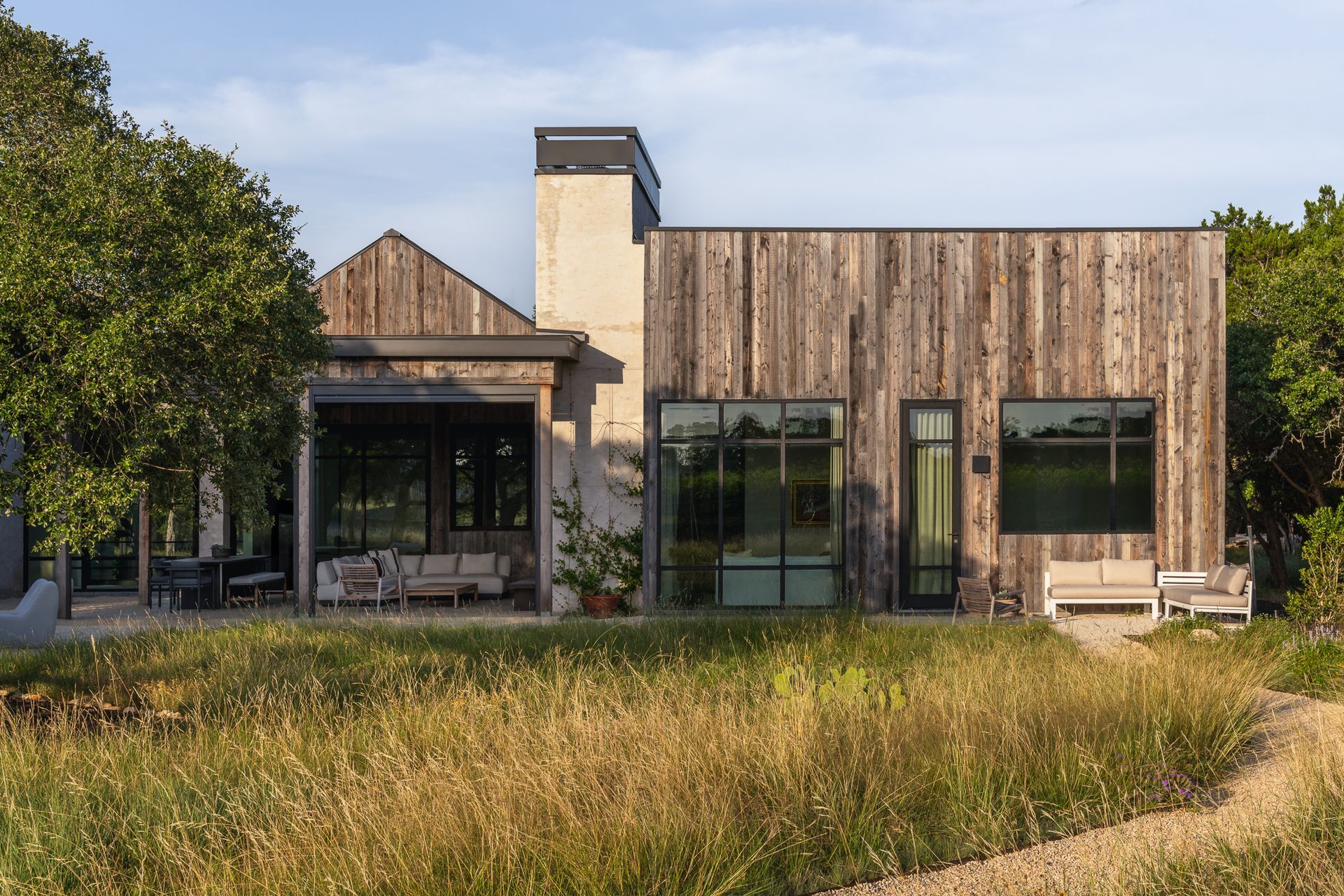 Mid-century-modern-rustic-custom-home-prairie-patio-path.jpg