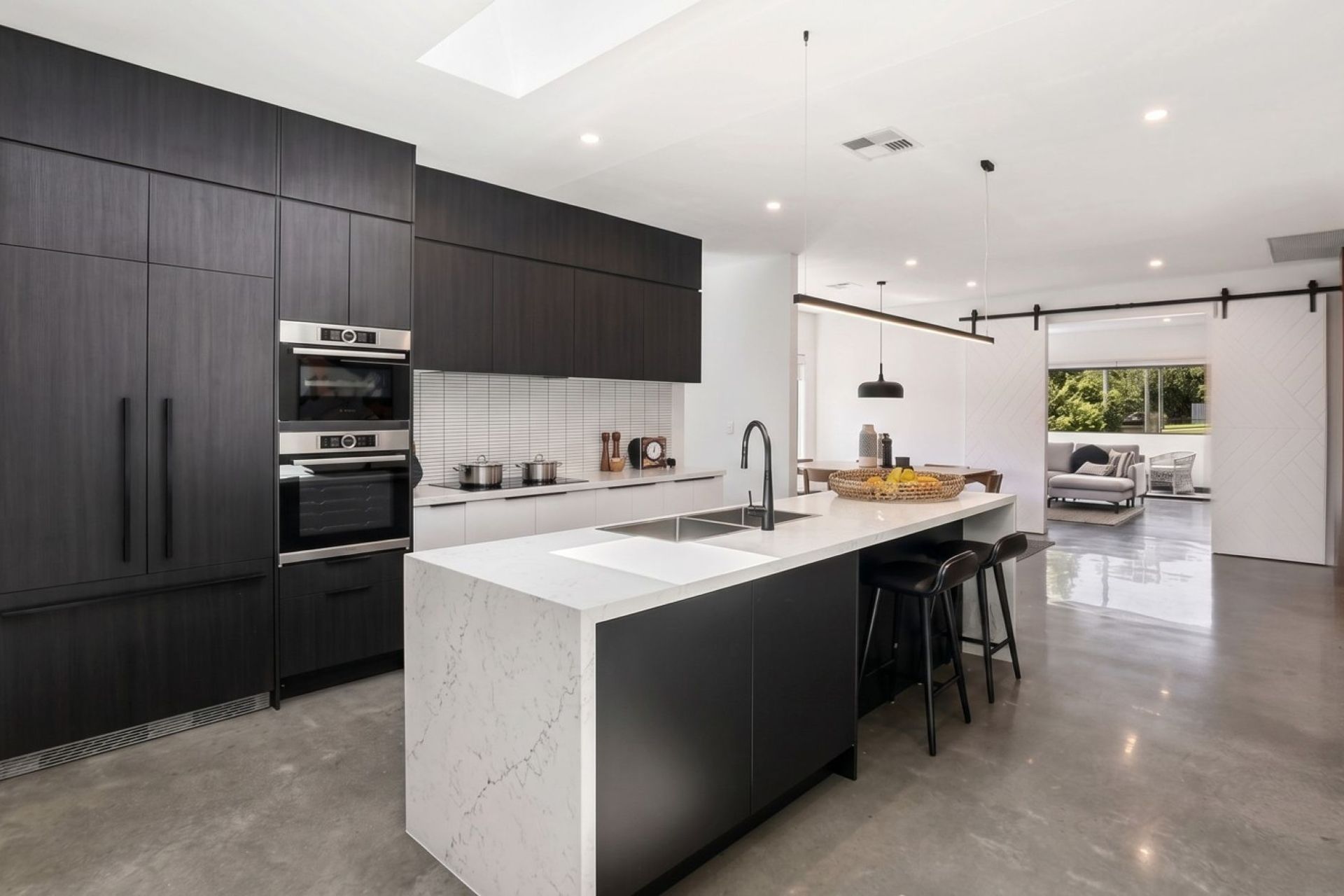 WHEELER-HEIGHTS-House-custom-home-design-by-Distinct-Innovations-Architectural-Drafting-Black-Kitchen.jpg