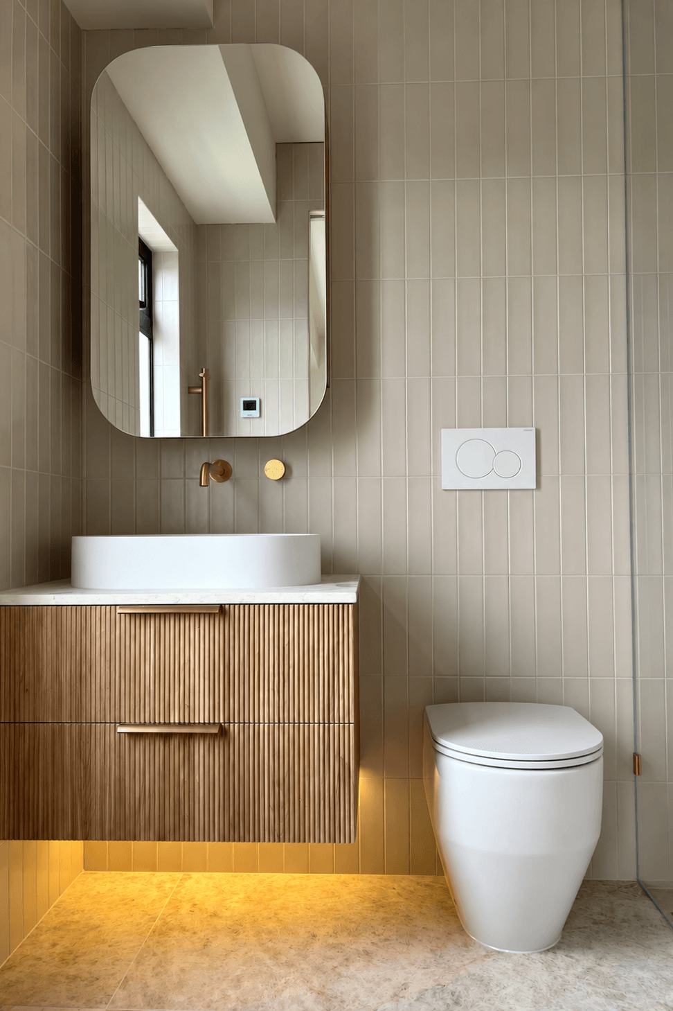 Warm-Minimalist-Bathroom-with-Brass-Details.png