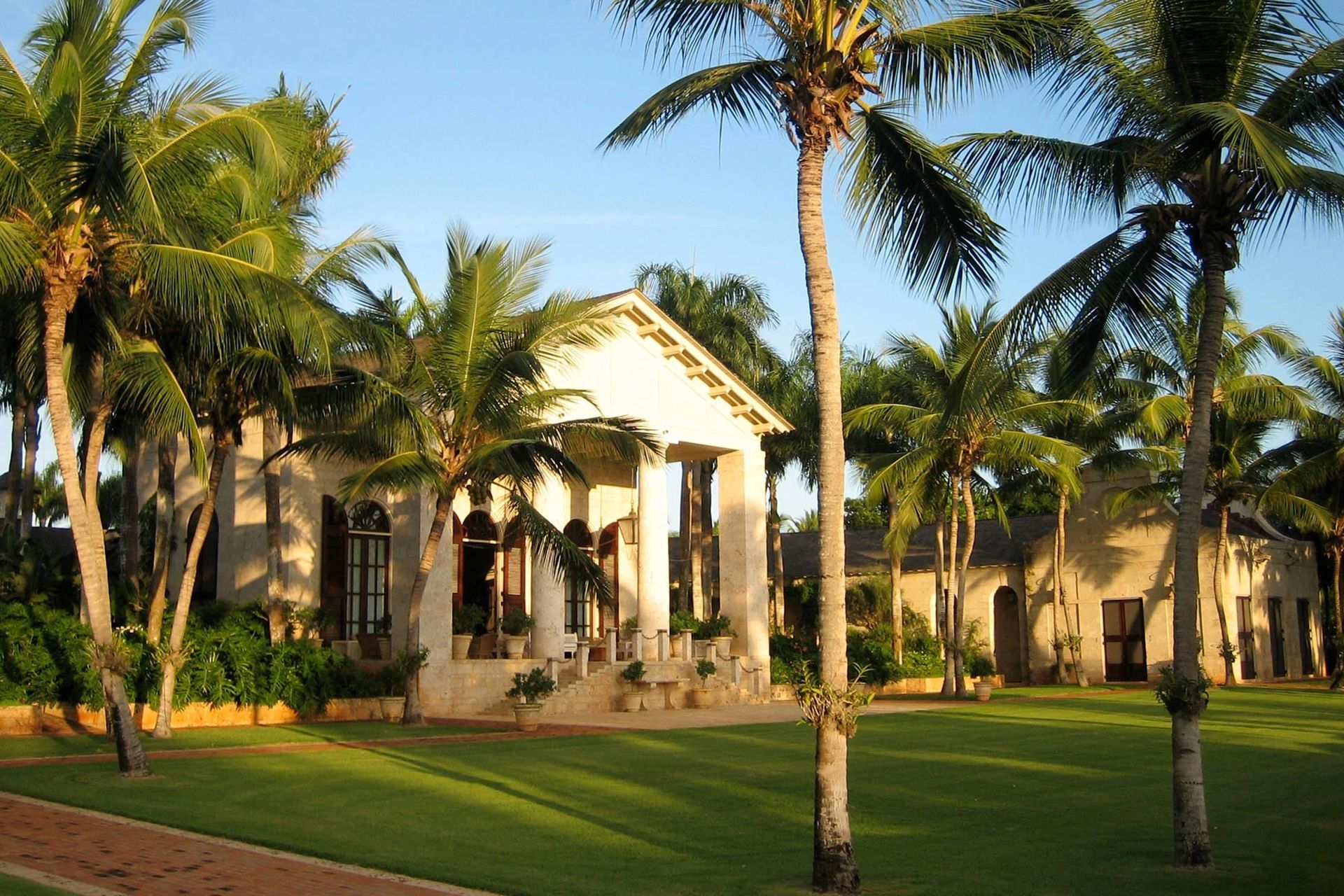 dominican-republic-coastal-retreat-palladian-villa-coral-stone-exterior-ap-compressed.jpg